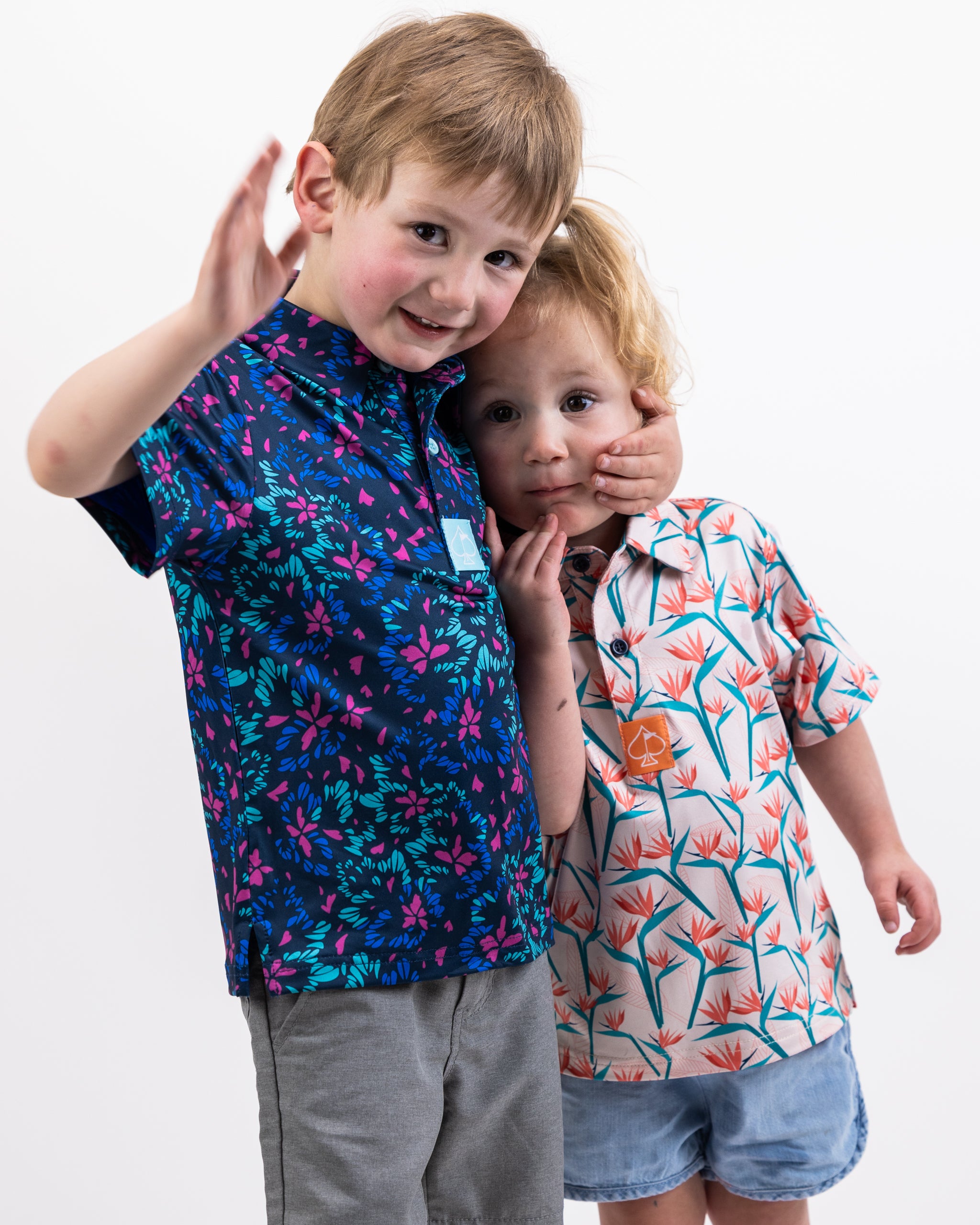 Youth fluorescent floral dress with vibrant colors and playful patterns.