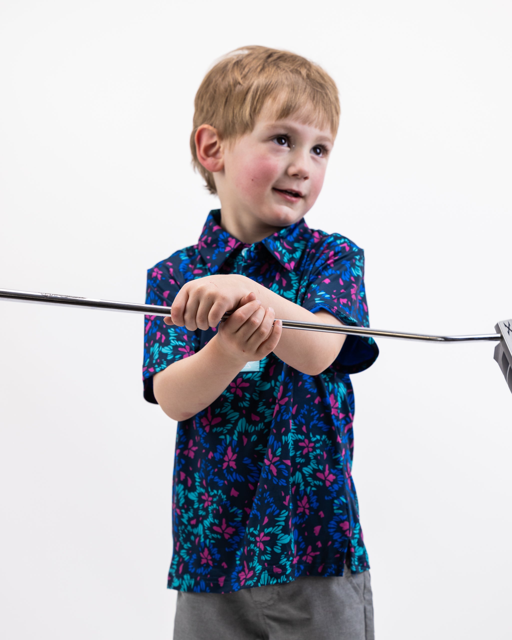 Youth fluorescent floral dress with vibrant colors and a playful design, perfect for spring outfits.