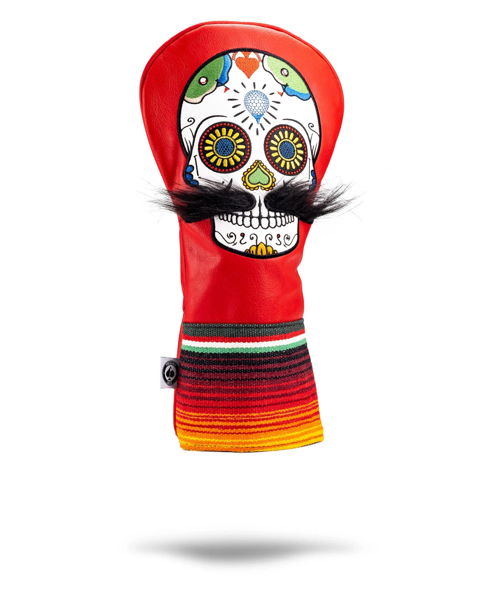 Colorful skull golf headcover with embroidered details, faux mustache, and vibrant striped sock for bold course style.