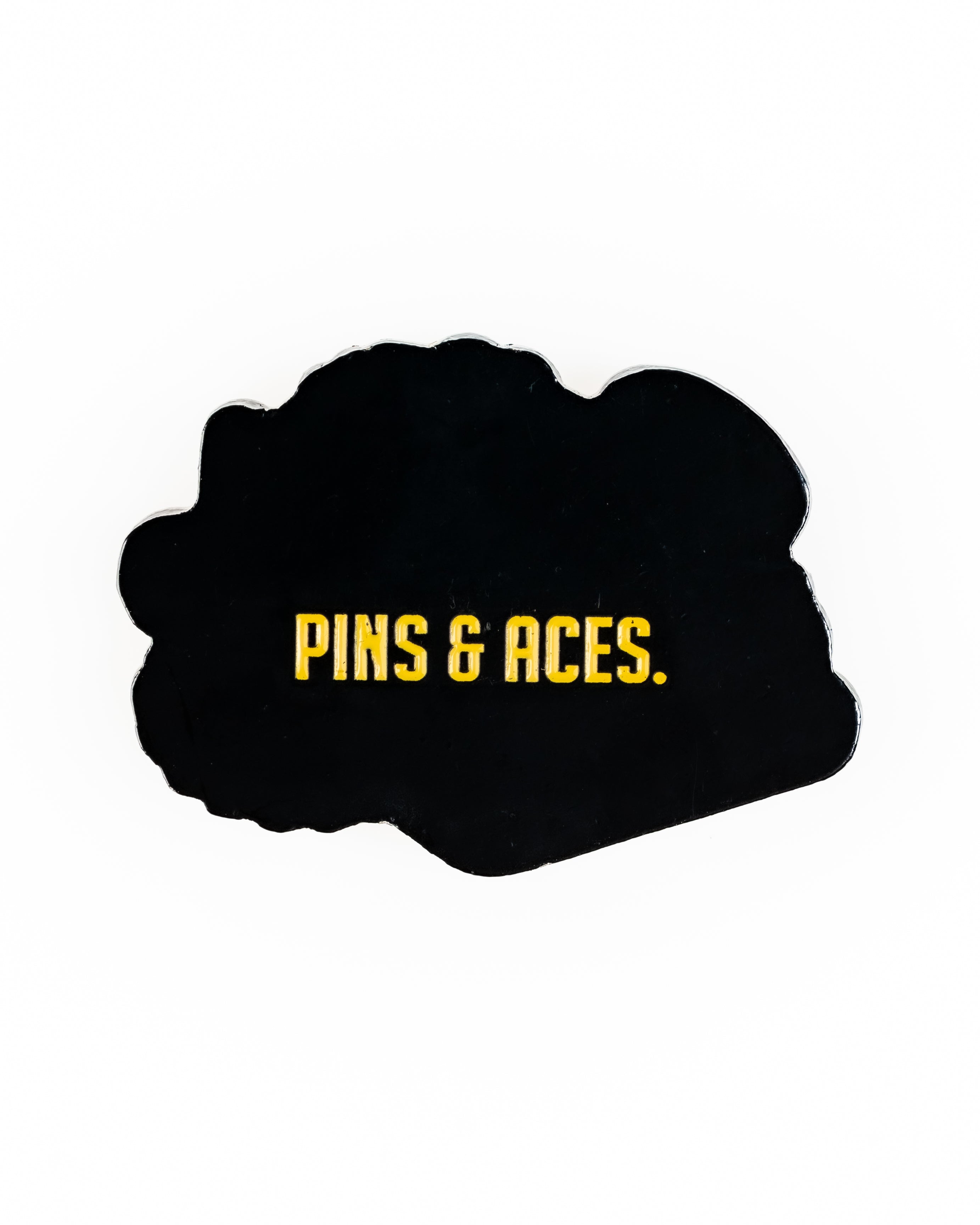Perforated rope hat in butter color featuring a bold "Pins & Aces" logo, perfect for stylish golfers.
