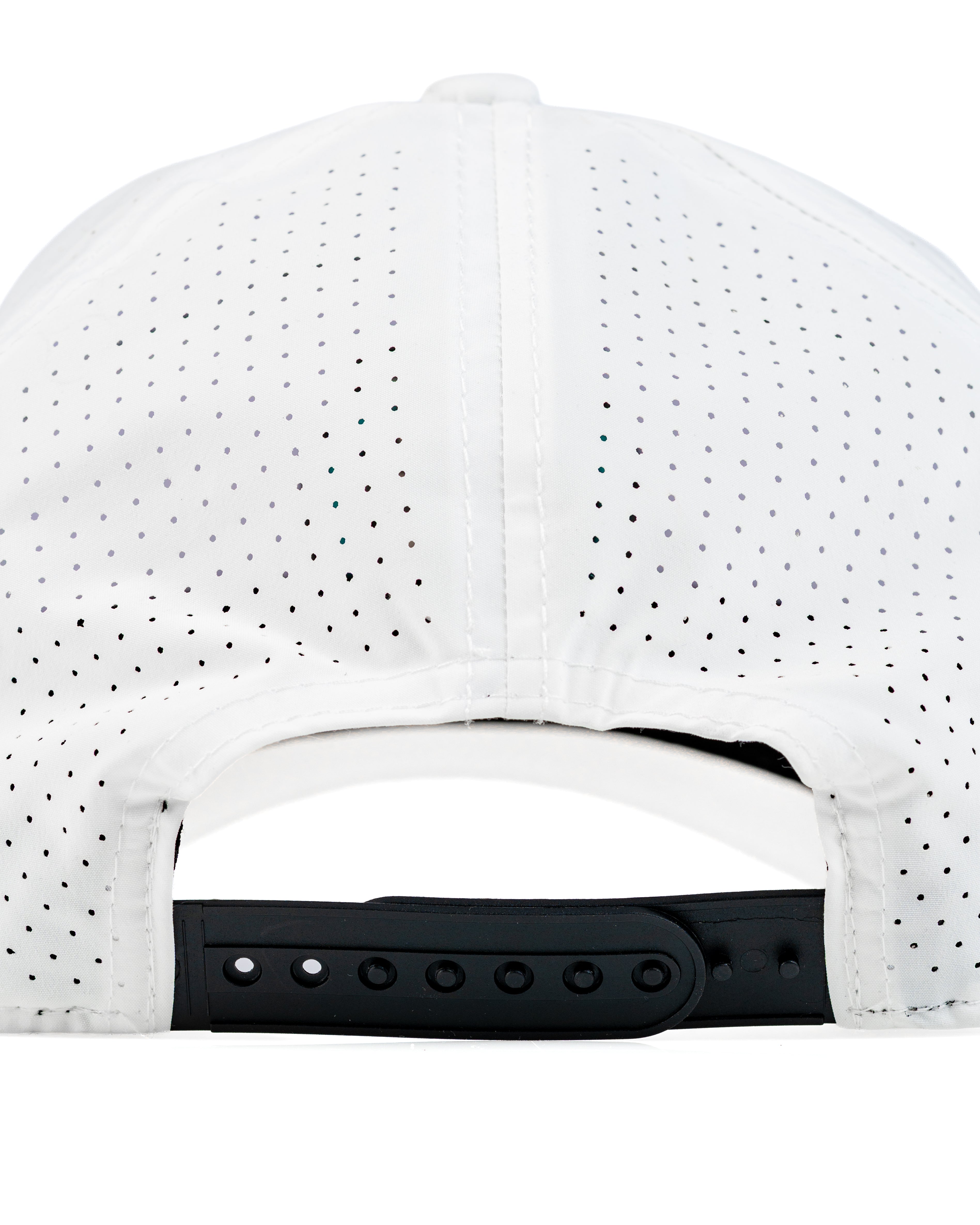 Back view of a white Tradesman Hat featuring perforated design and an adjustable black strap for a comfortable fit.