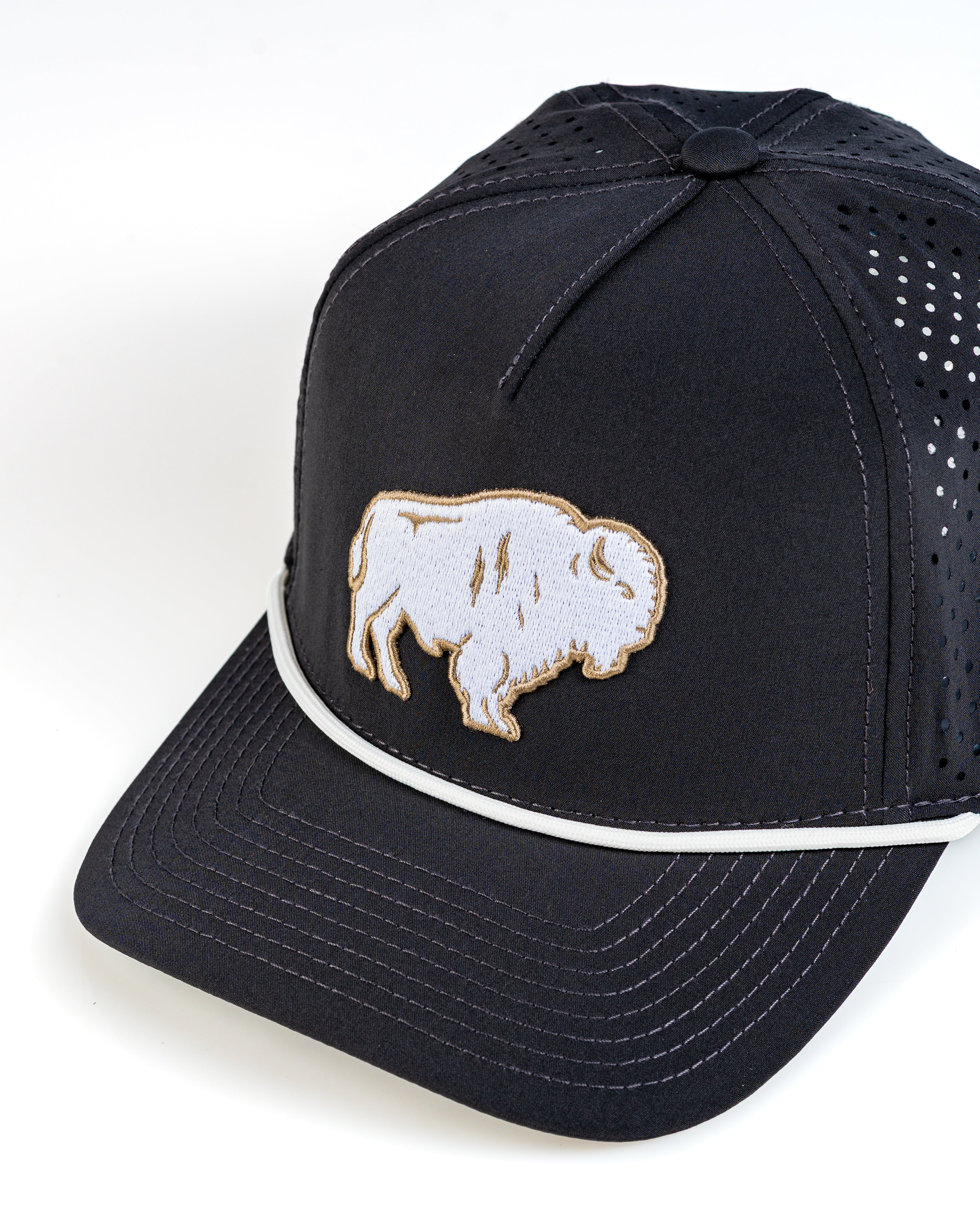 Perforated black rope hat featuring a Great White Buffalo embroidered design on the front. Ideal for stylish golfers.