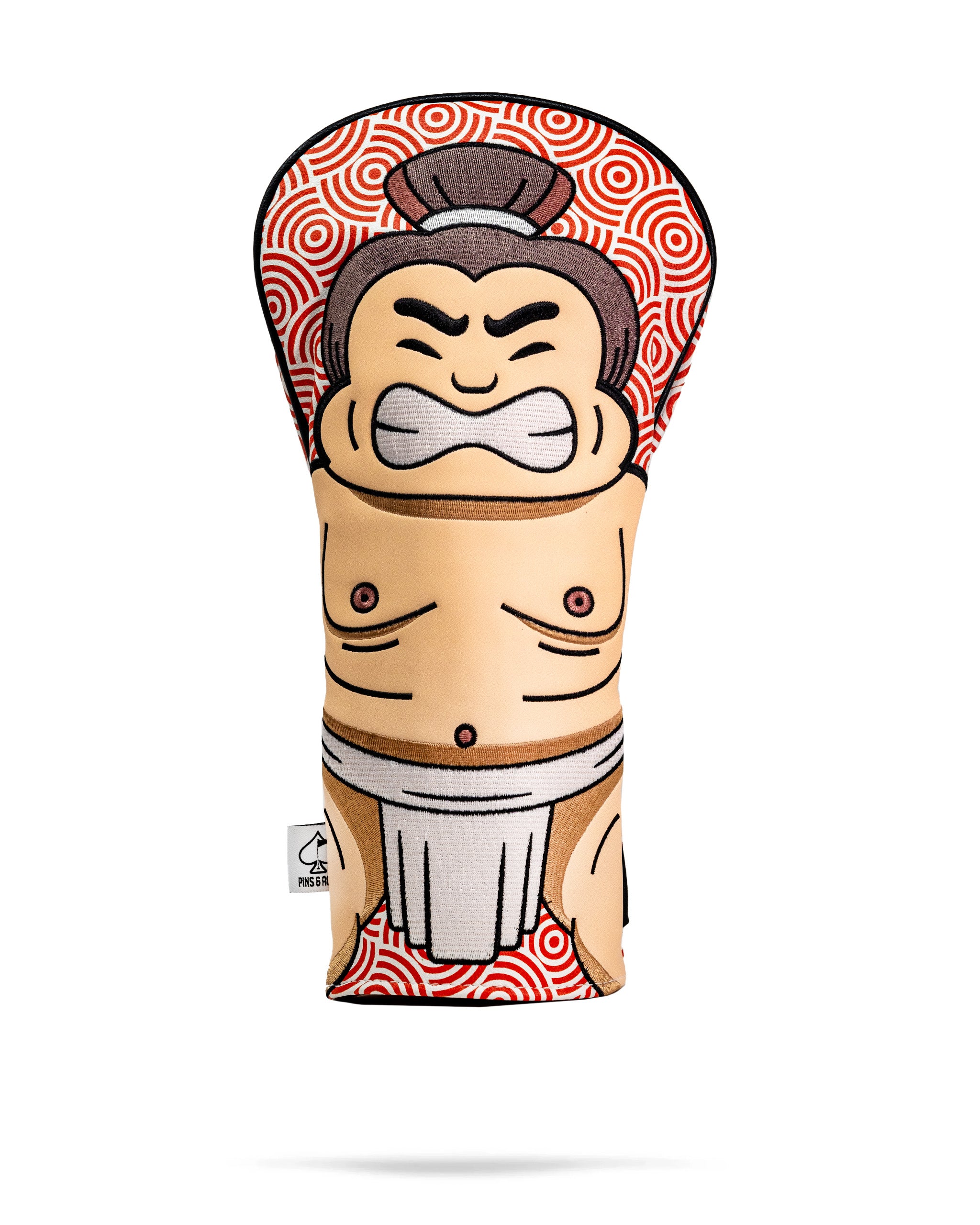 Sumo wrestler-themed golf driver cover with a cartoon face, muscular torso, and traditional sumo attire design.
