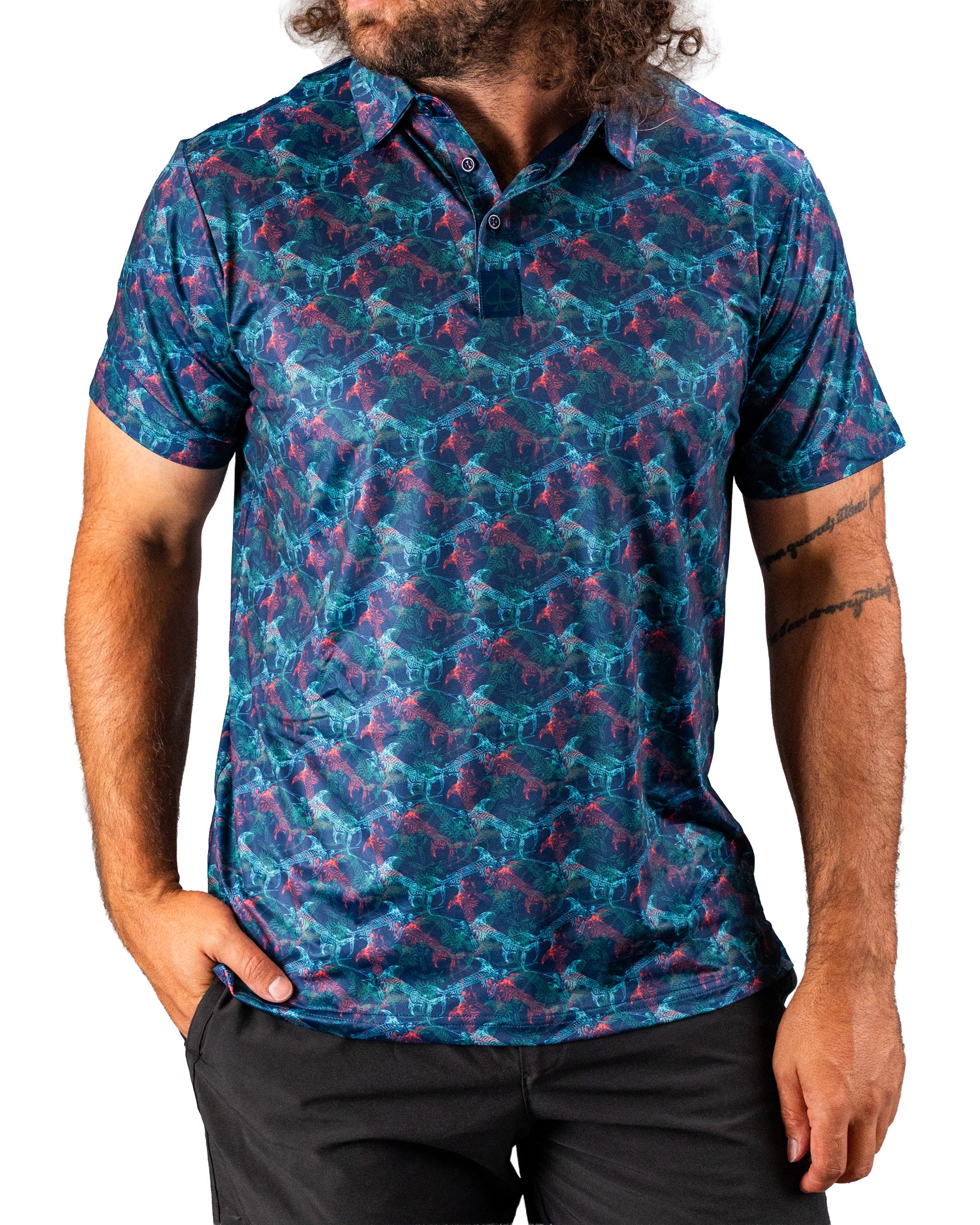Bold golf polo featuring a vibrant swordfish pattern in blue and pink hues, designed for stylish performance on the course.