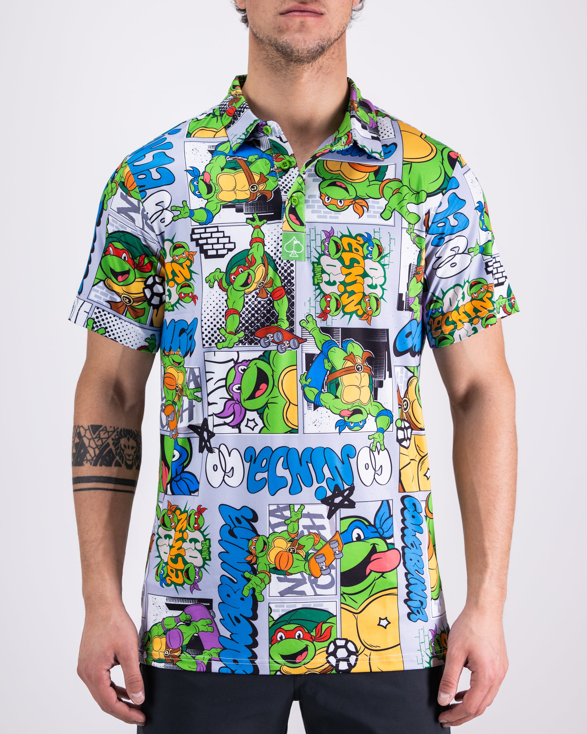TMNT comic strip polo shirt featuring vibrant graphics of the Teenage Mutant Ninja Turtles in action.