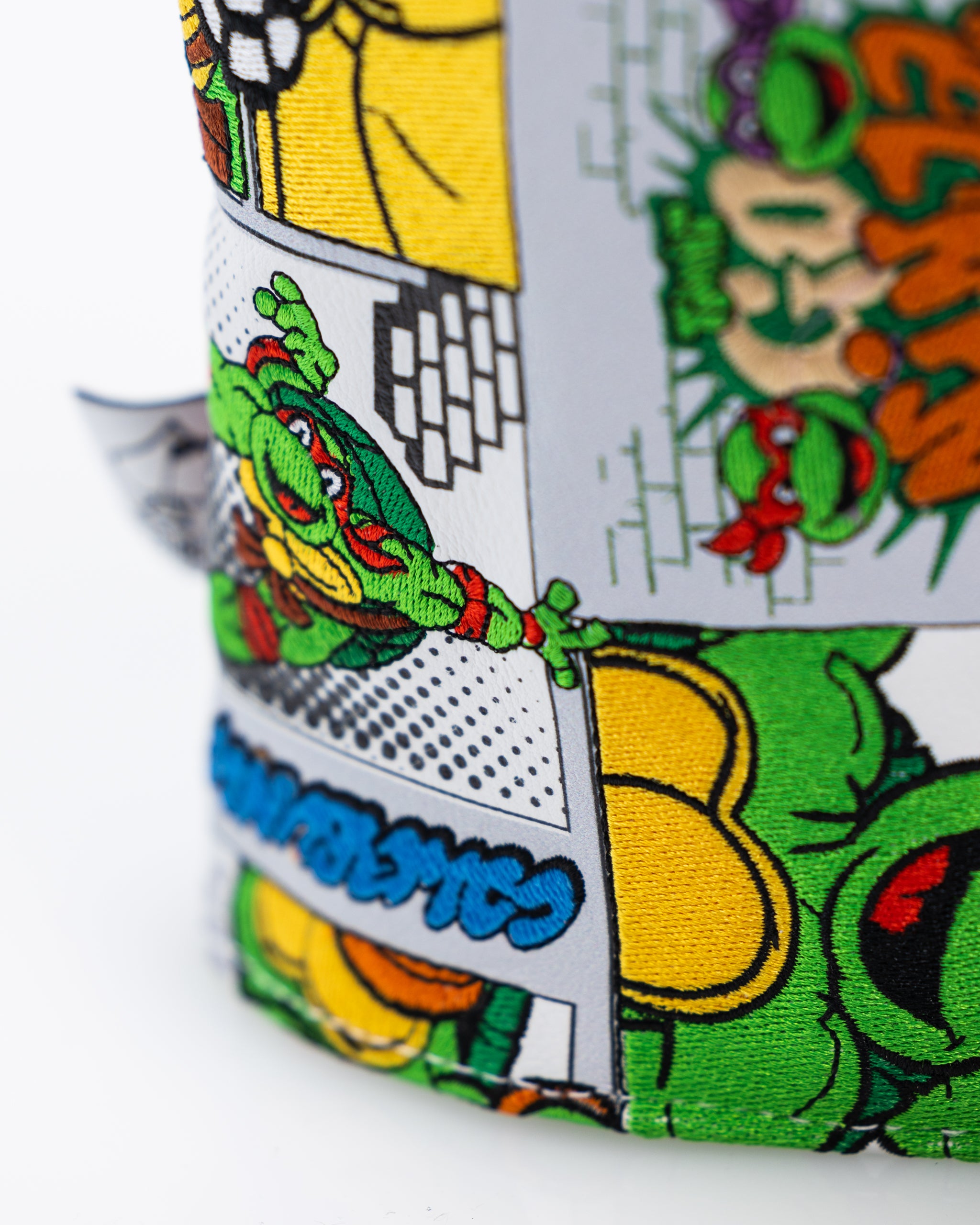 TMNT Comics Driver Cover featuring vibrant artwork of Teenage Mutant Ninja Turtles in action.