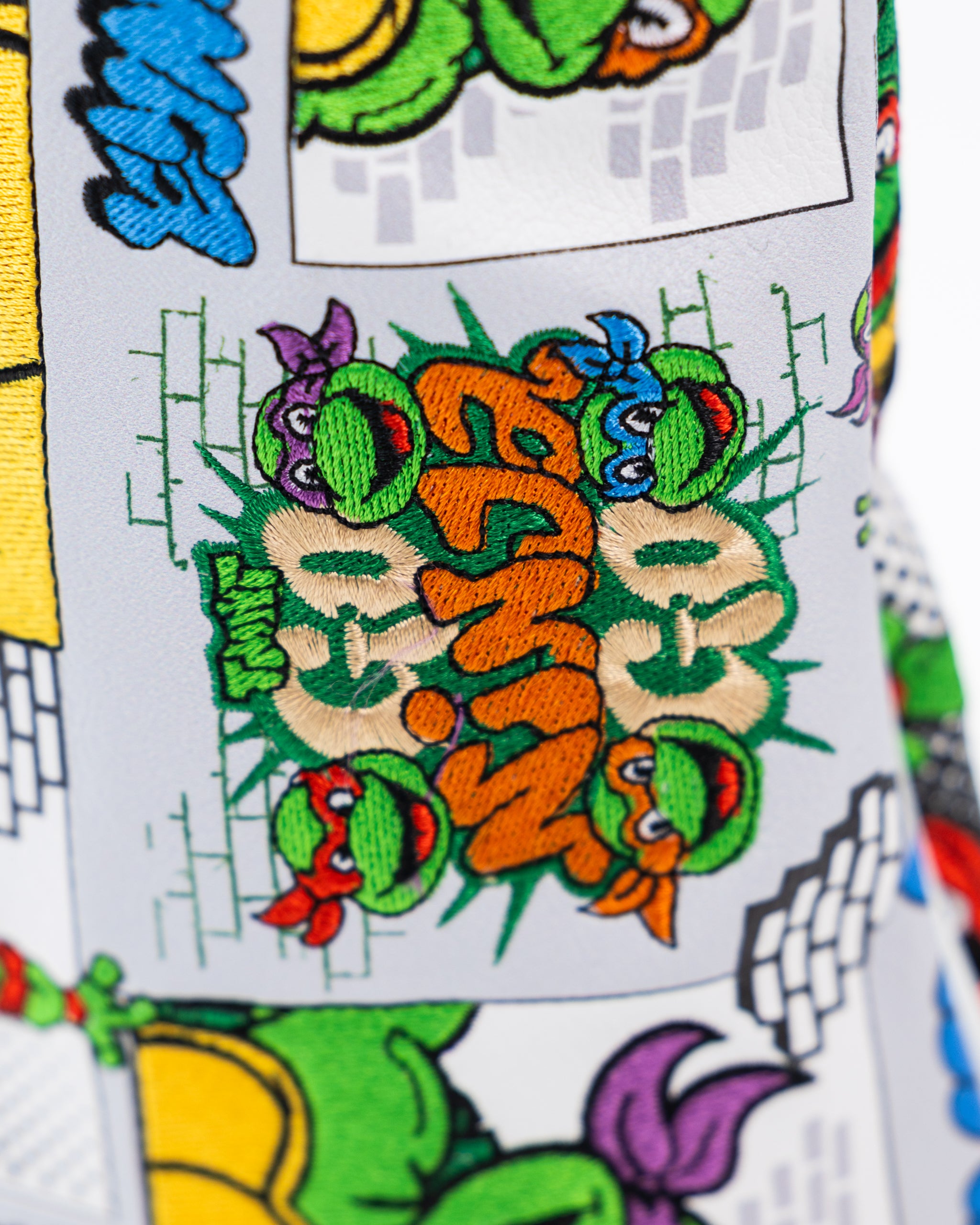 TMNT Comics Driver Cover featuring Teenage Mutant Ninja Turtles in action poses with vibrant colors.