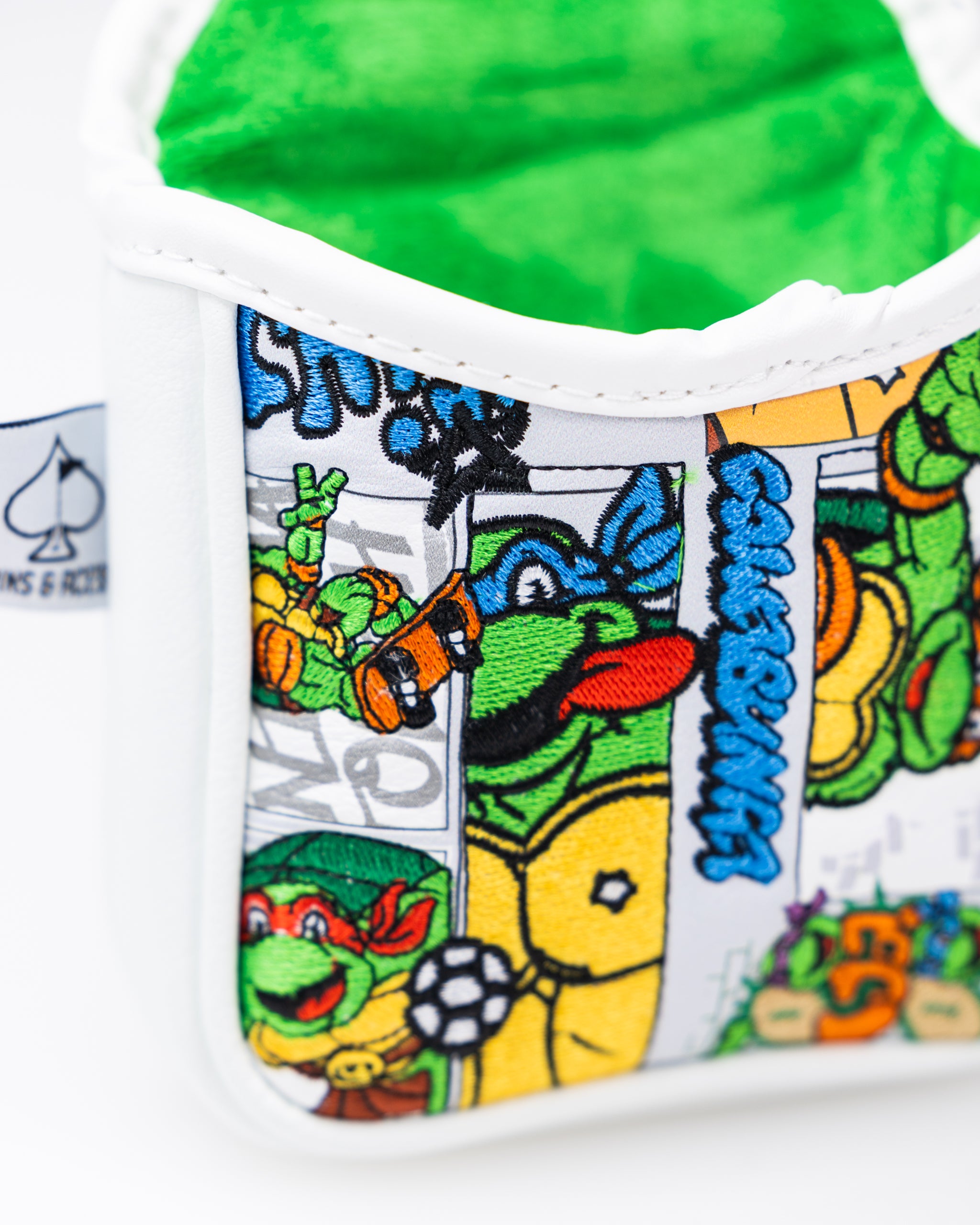 TMNT Comics Mallet Cover featuring colorful Teenage Mutant Ninja Turtles graphics and a durable design.