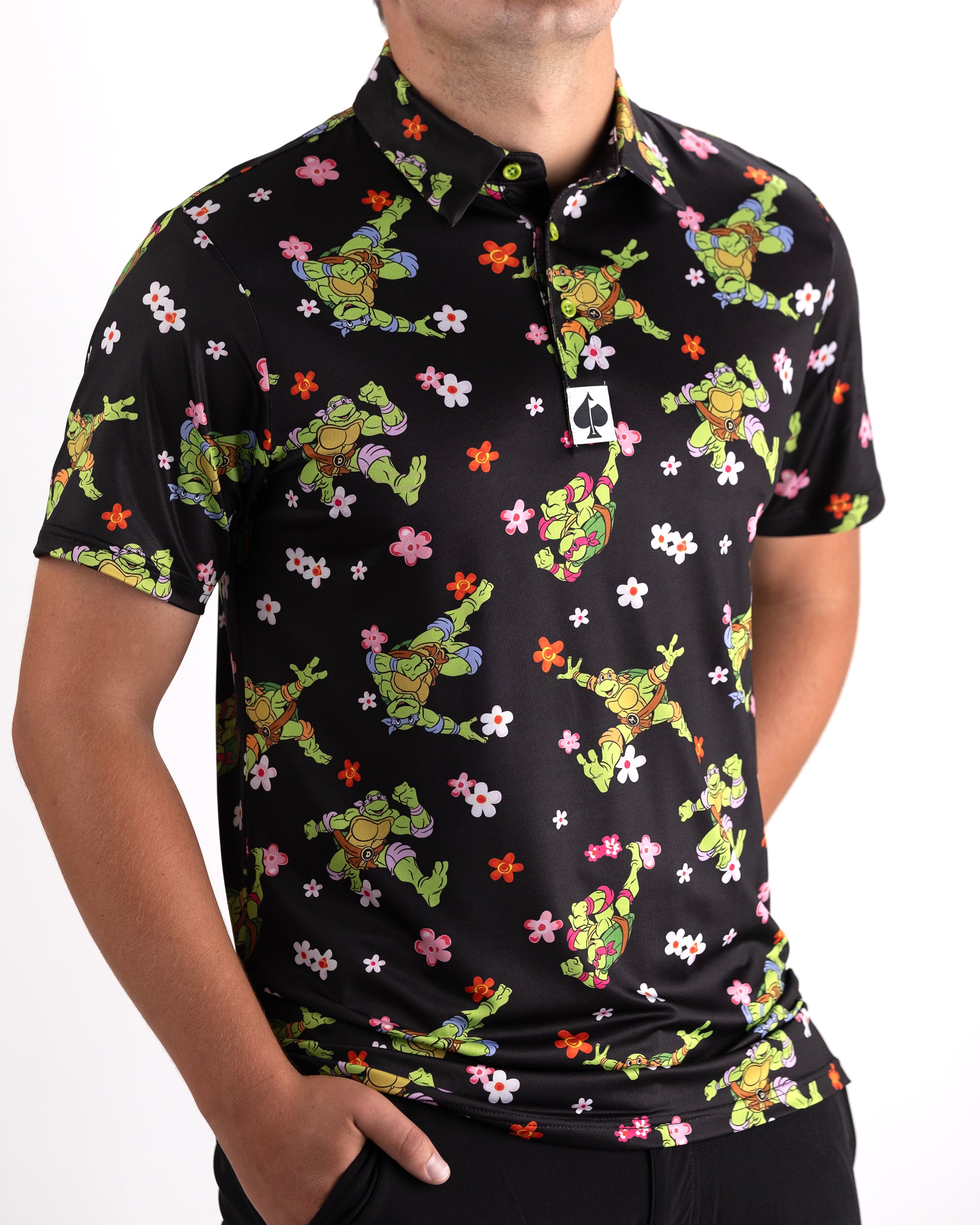 TMNT Turtle Flower Power graphic t-shirt featuring vibrant colors and iconic Teenage Mutant Ninja Turtles design.