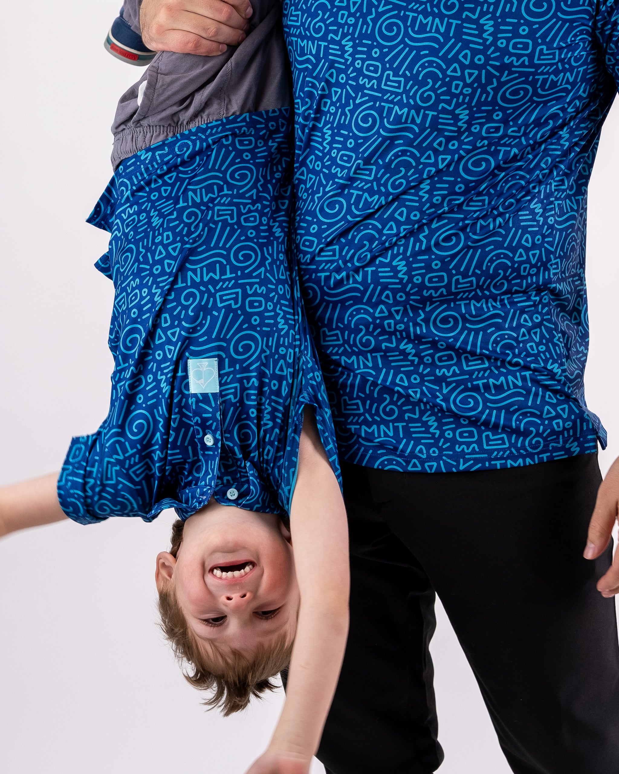 TMNT youth doodle shirt featuring vibrant Teenage Mutant Ninja Turtles graphics and colorful designs.