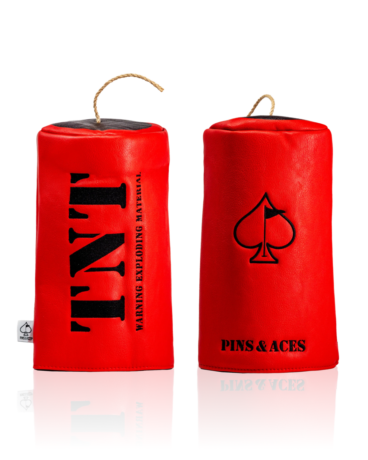 Bold red driver cover featuring "TNT" and "Pins & Aces" branding, designed to make a statement on the golf course.