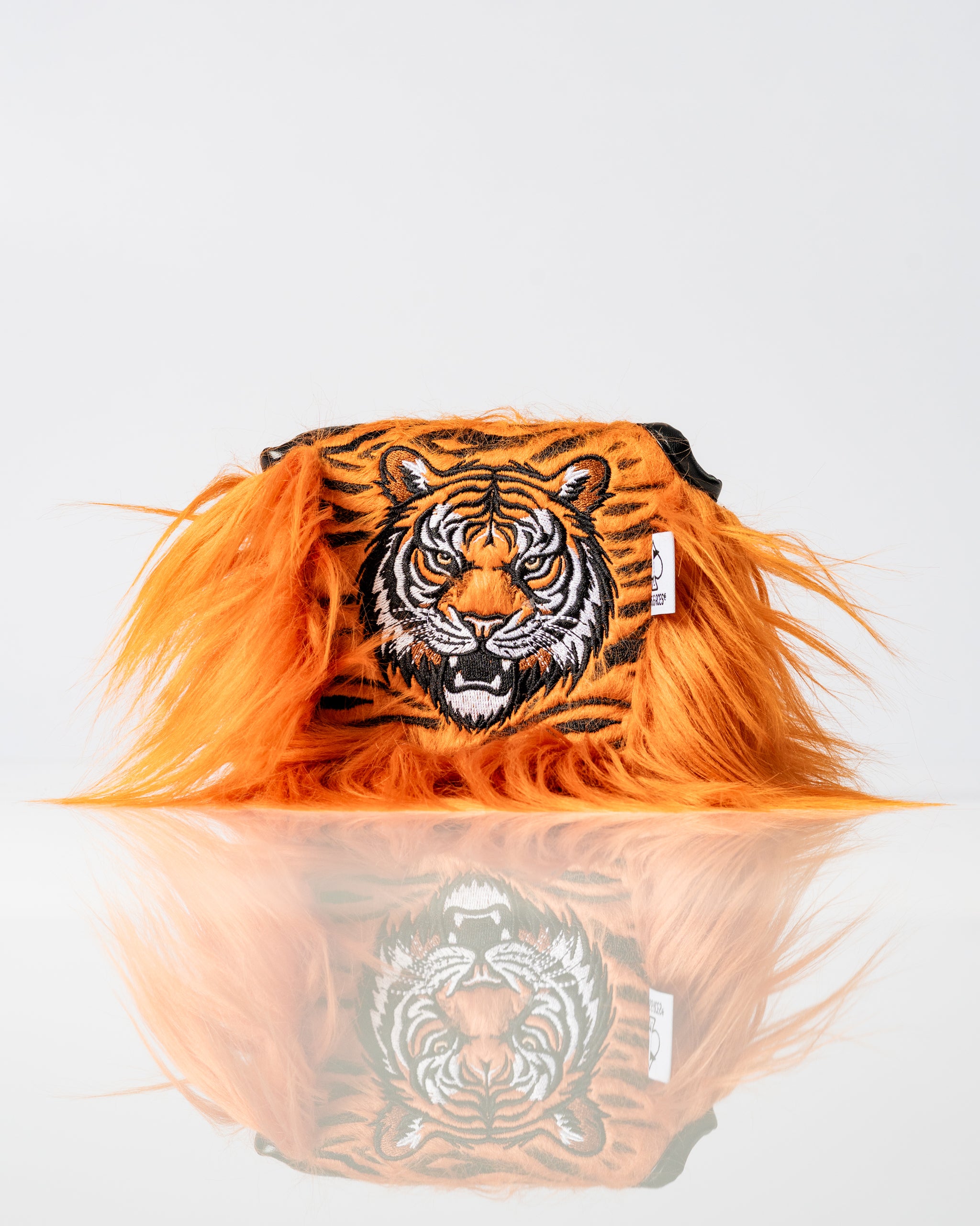 Bold tiger-themed mallet putter cover featuring vibrant orange fur and detailed embroidery, perfect for standout golfers.