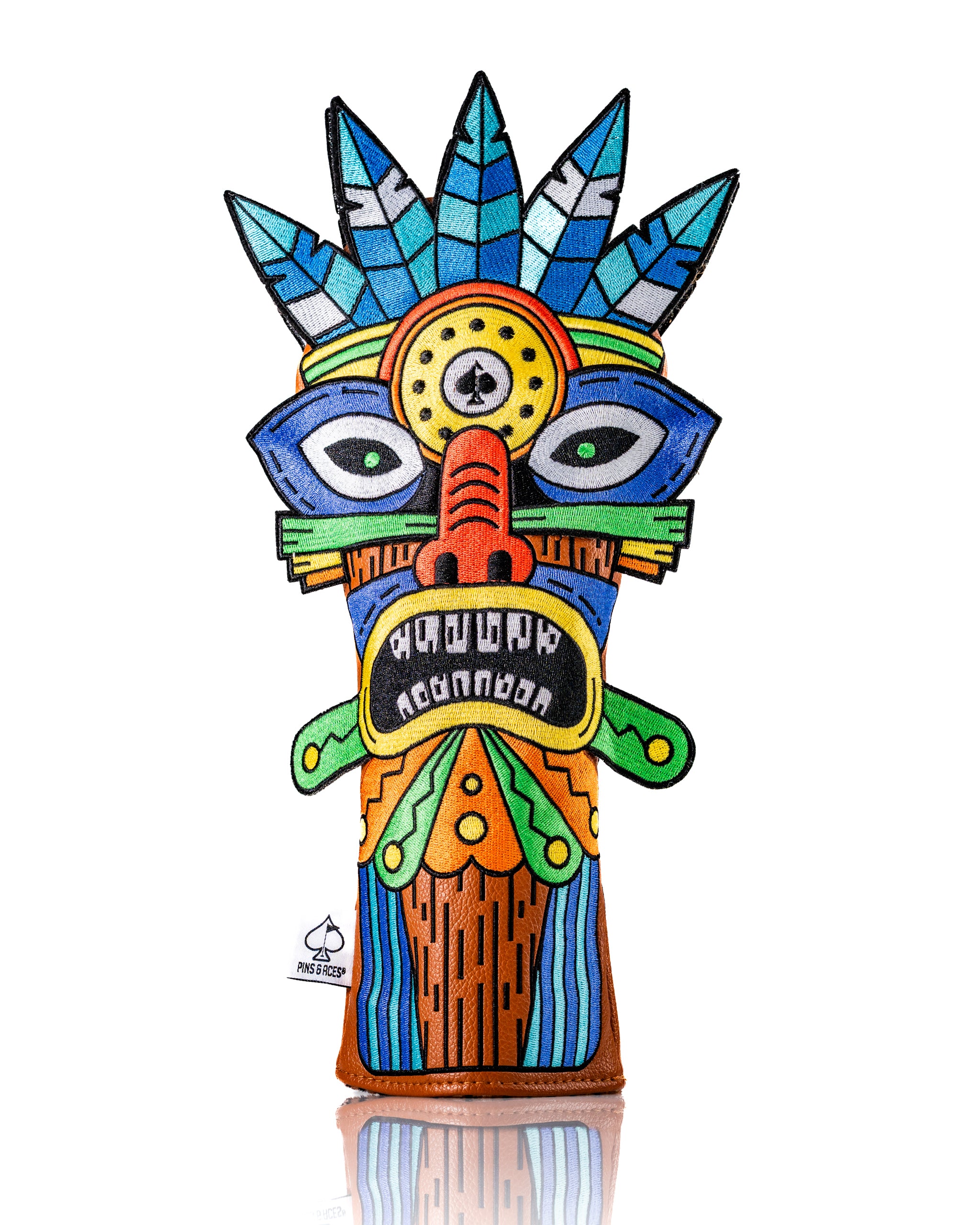 Colorful Tiki hybrid golf club cover featuring a vibrant tribal mask design with intricate details and patterns.