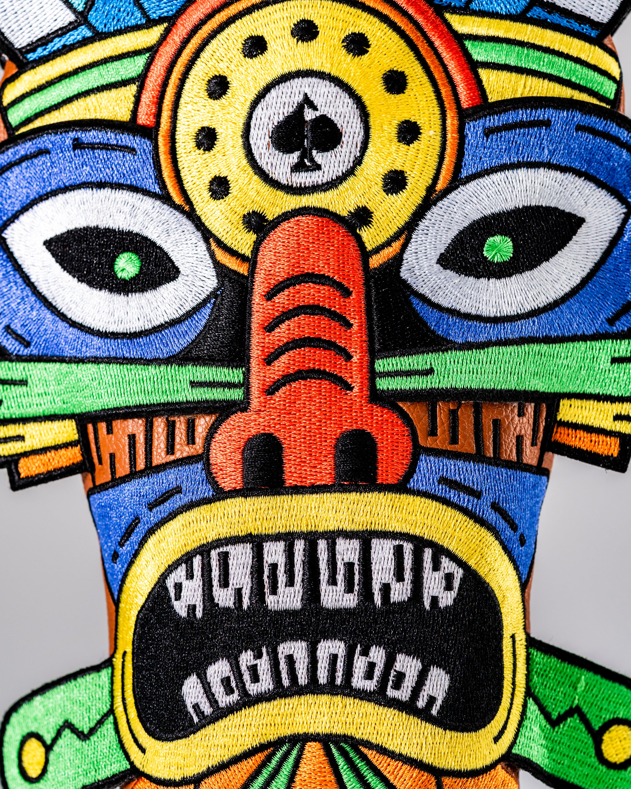 Vibrant Tiki hybrid golf cover featuring bold colors and intricate designs, perfect for adding flair on the course.