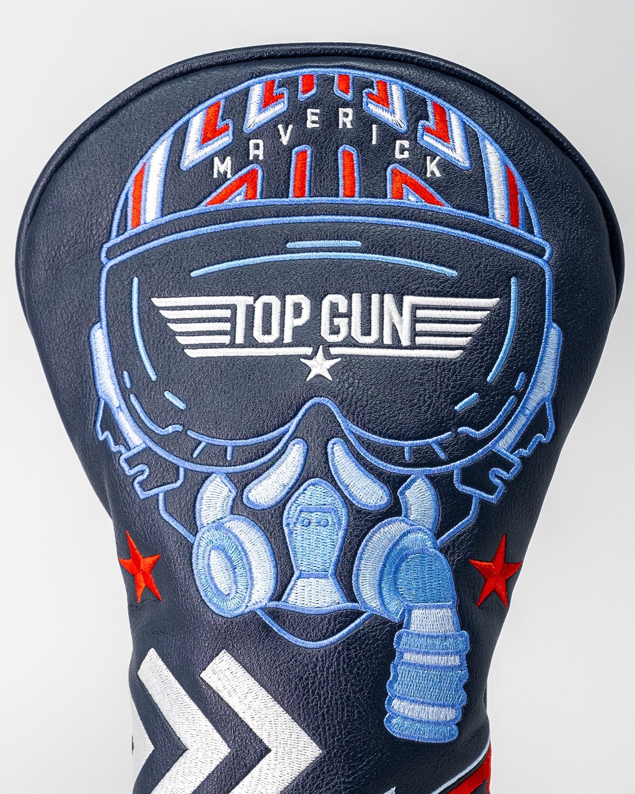 Embroidered golf headcover featuring a Top Gun Maverick theme with sunglasses, headphones, and aviation-inspired design.