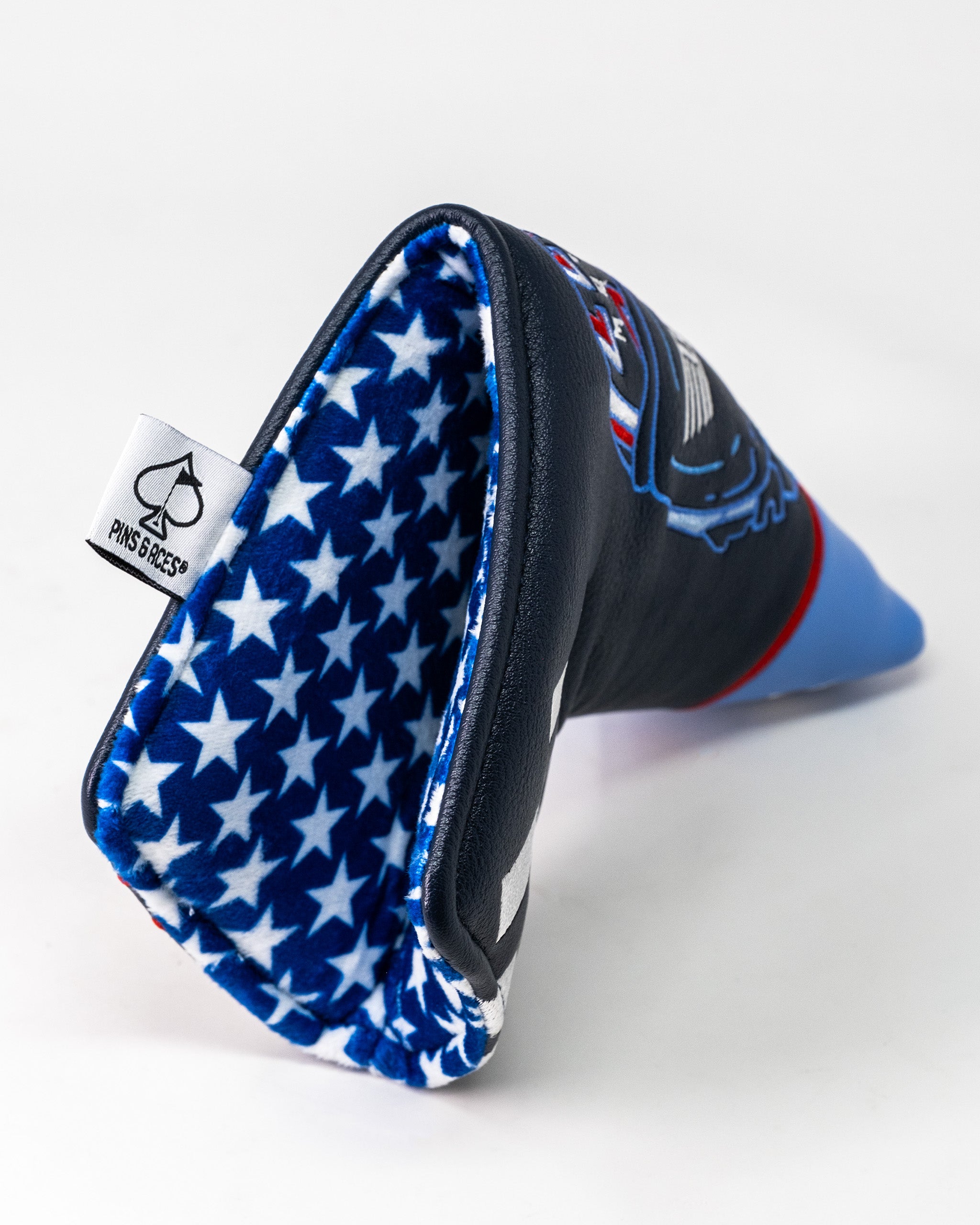 Top Gun Maverick Blade Headcover with black exterior, blue interior lining featuring white stars, and a Top Gun logo design.