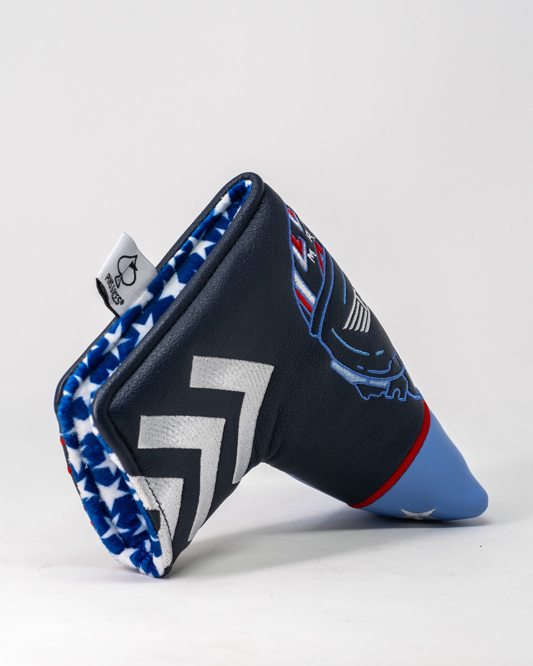 Top Gun Maverick Blade Headcover featuring a navy blue design with patriotic stars and graphics inspired by the movie.