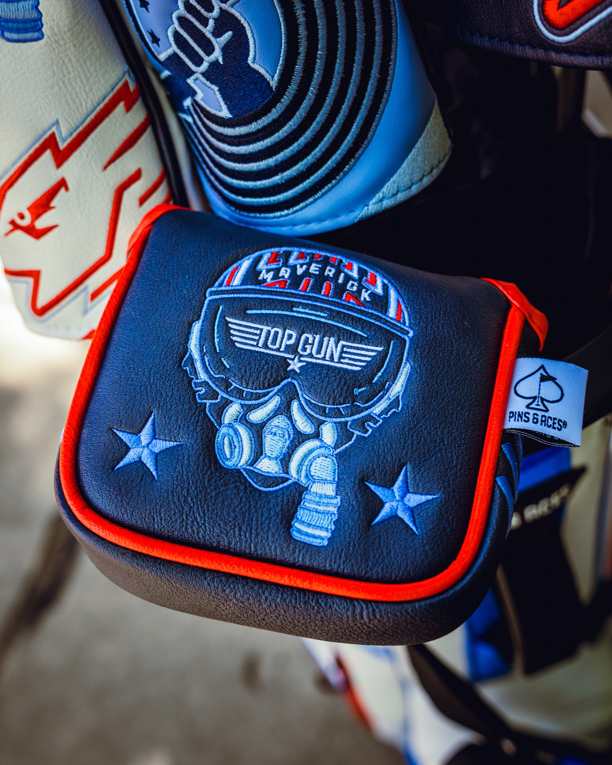 Mallet headcover featuring a Top Gun Maverick design with a skull wearing goggles, stars, and aviation-inspired details.