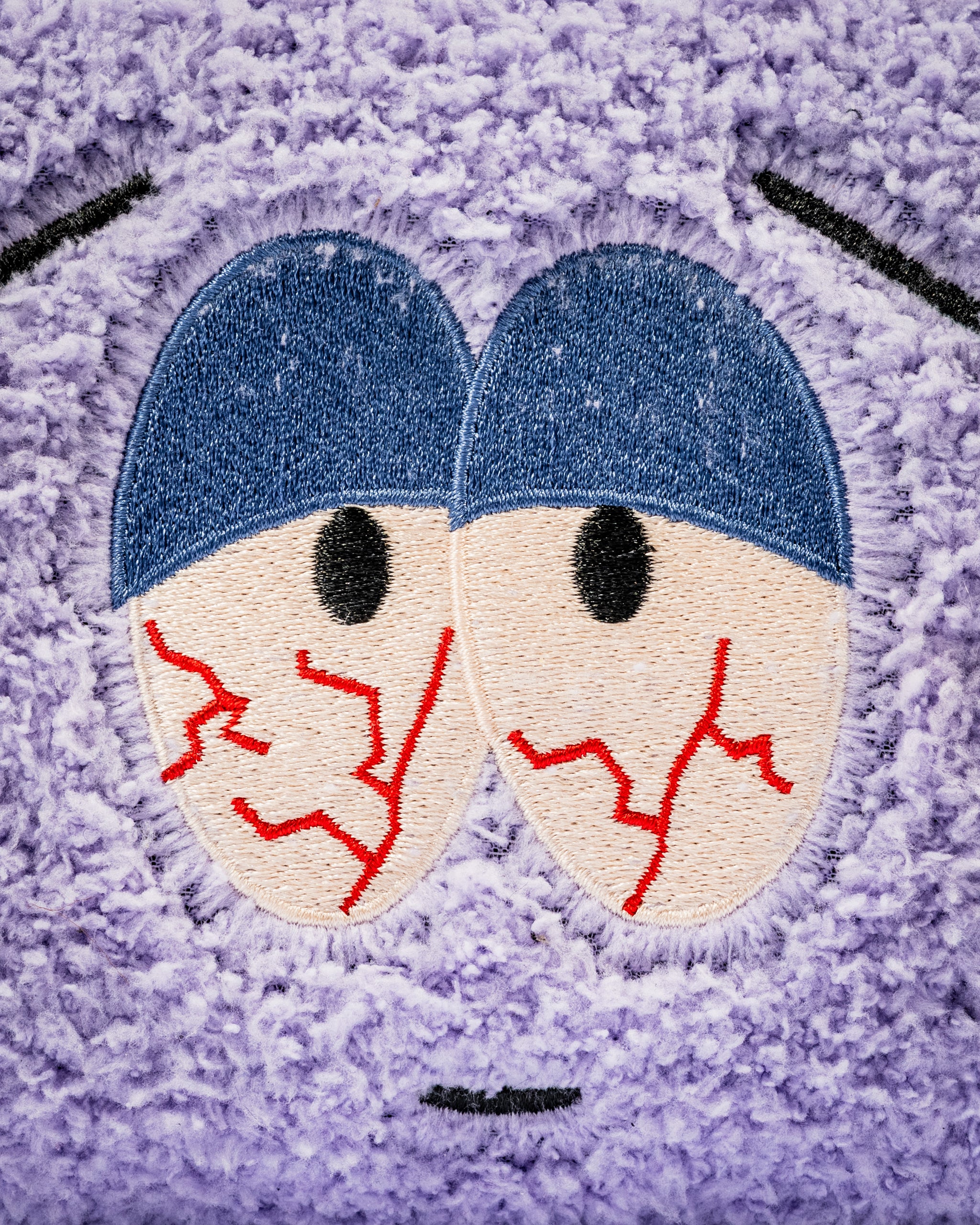 South Park Towelie center shaft mallet putter cover featuring Towelie's embroidered eyes and signature purple texture.