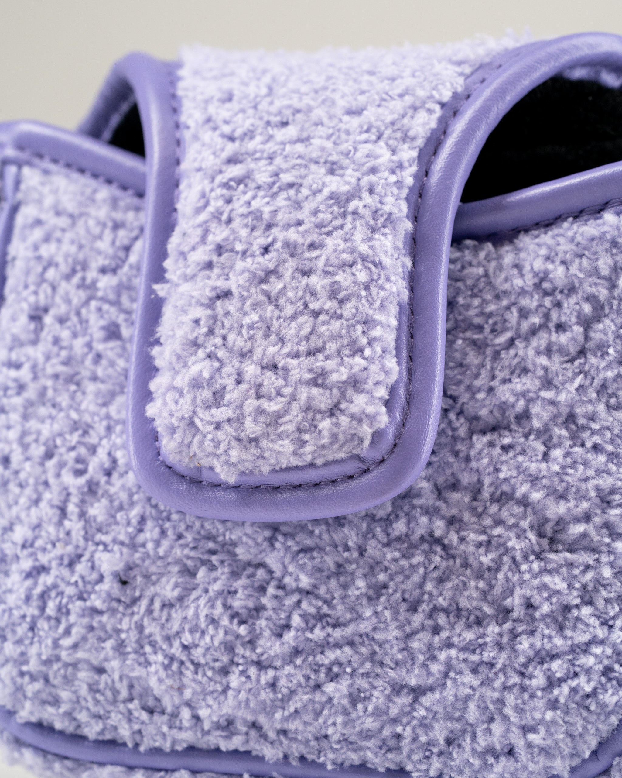 Purple towel-like mallet putter cover featuring a soft texture, designed for golf enthusiasts who enjoy unique accessories.