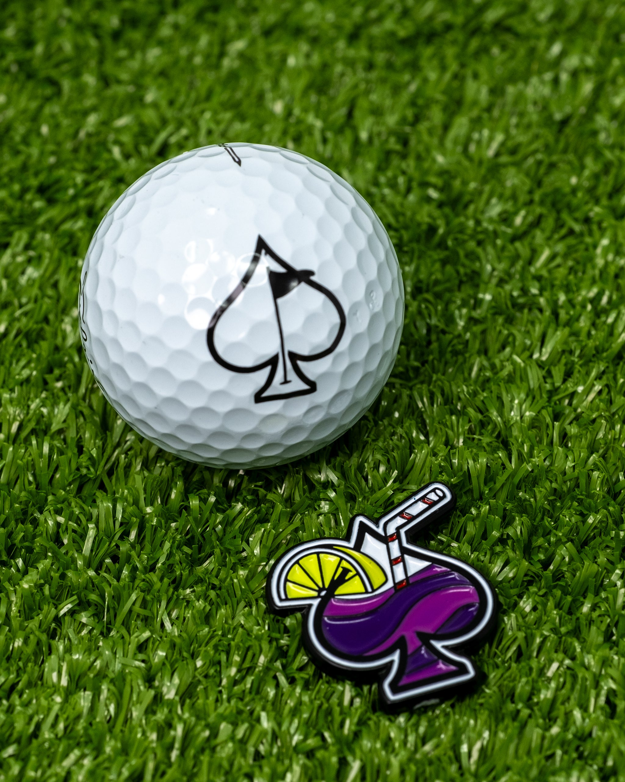 Transfusion spade ball marker featuring a sleek design with a spade shape and vibrant colors.