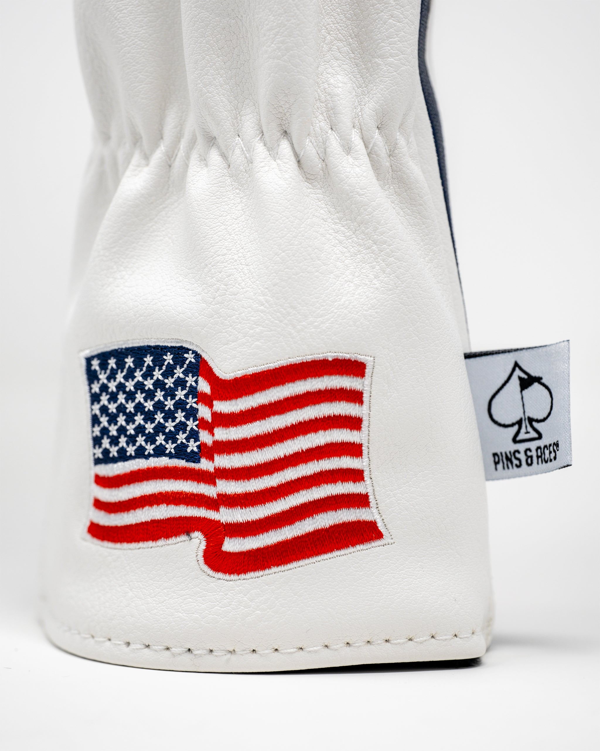 Trump Fairway Golf Club Head Cover featuring a detailed design of Donald Trump's likeness on a sleek protective fabric.