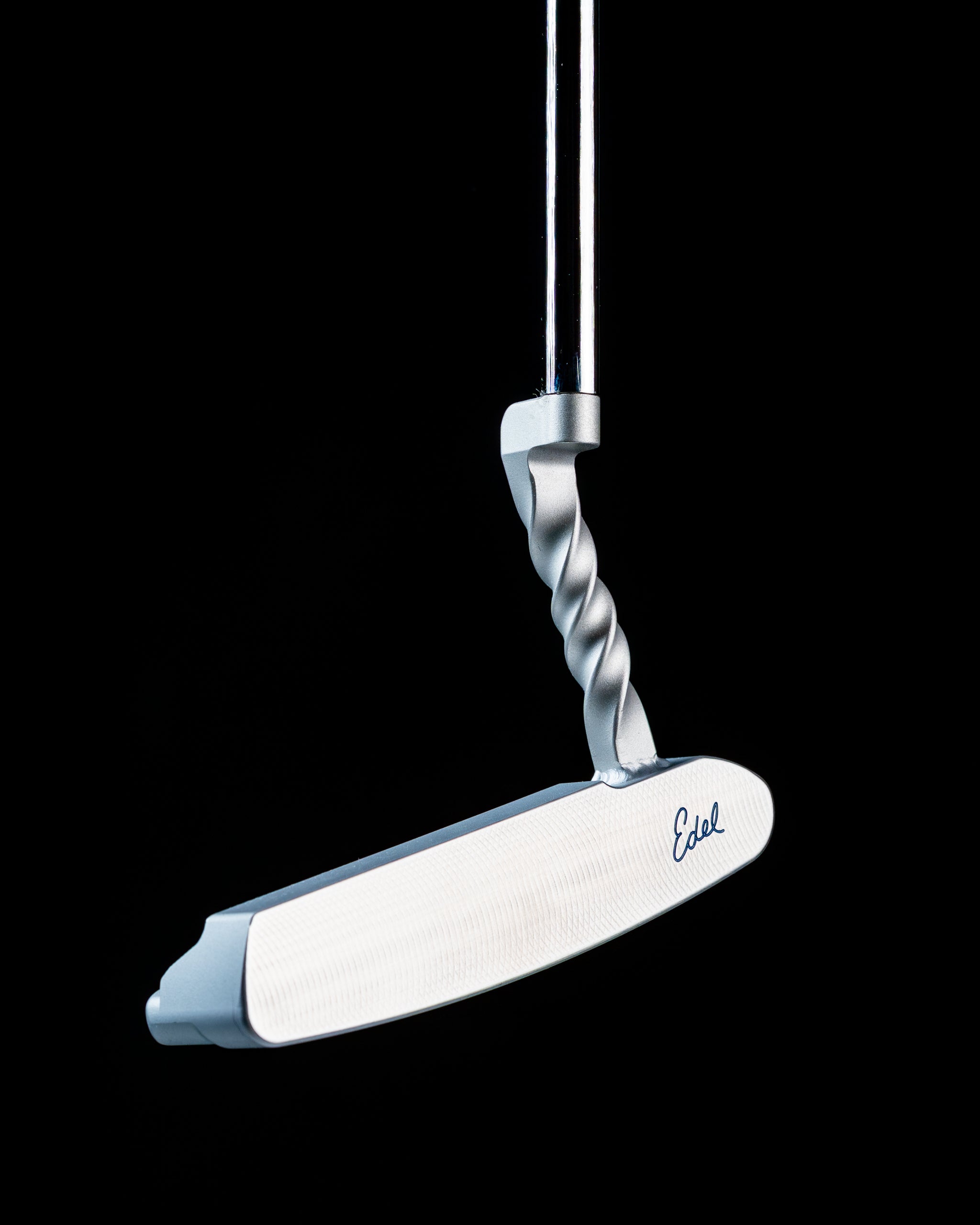 Edel Twister Putter featuring a unique twisted design and a sleek white face, ideal for precision putting on the green.