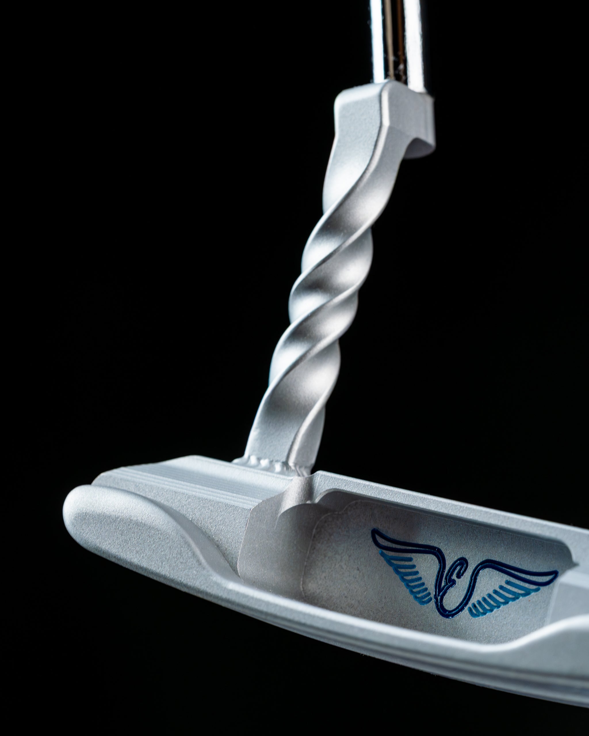 Edel Twister Putter featuring a unique twisted shaft design and sleek silver finish for enhanced performance on the green.