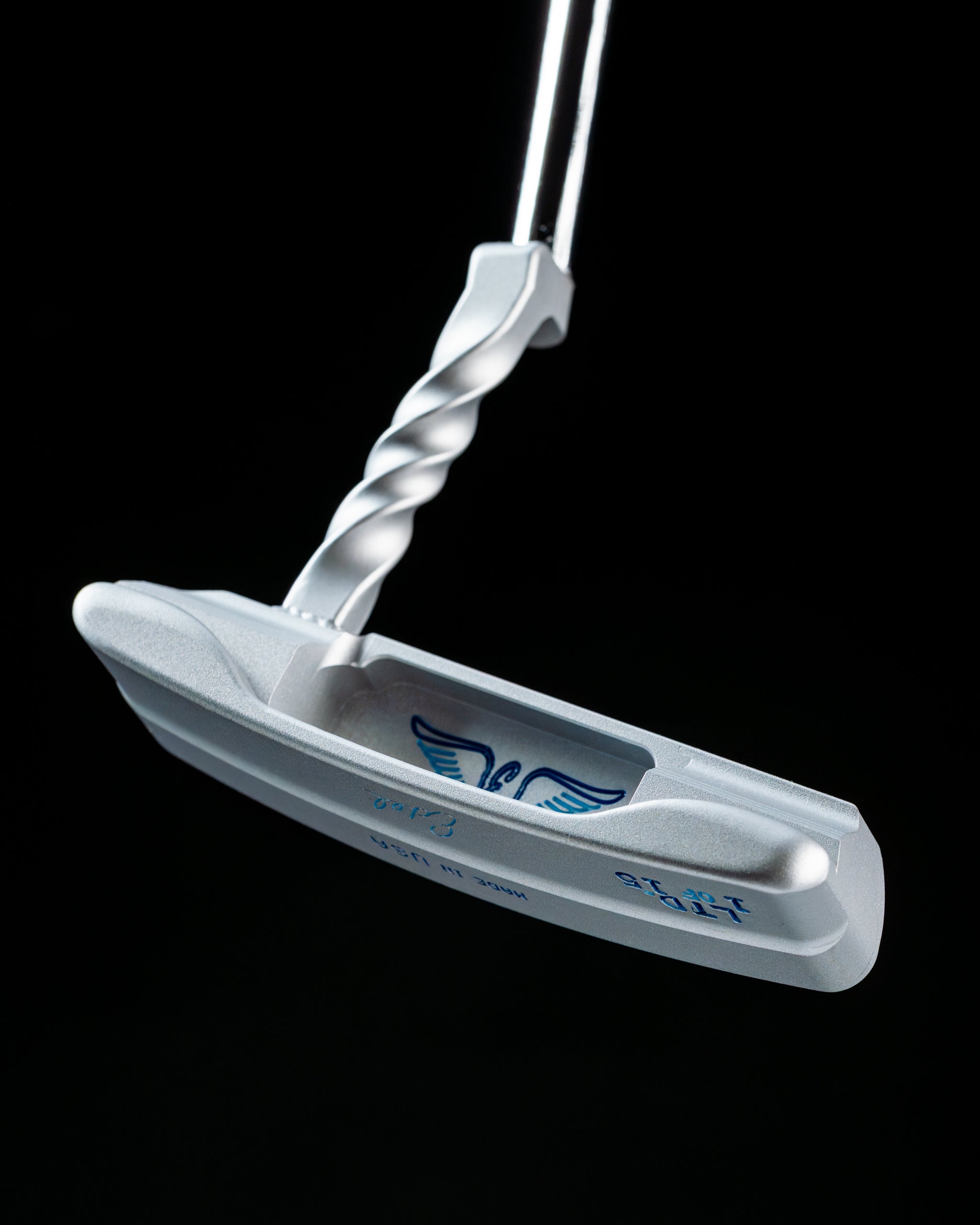 Edel Twister Putter with a unique twisted shaft design and sleek silver finish, ideal for precision putting on the green.