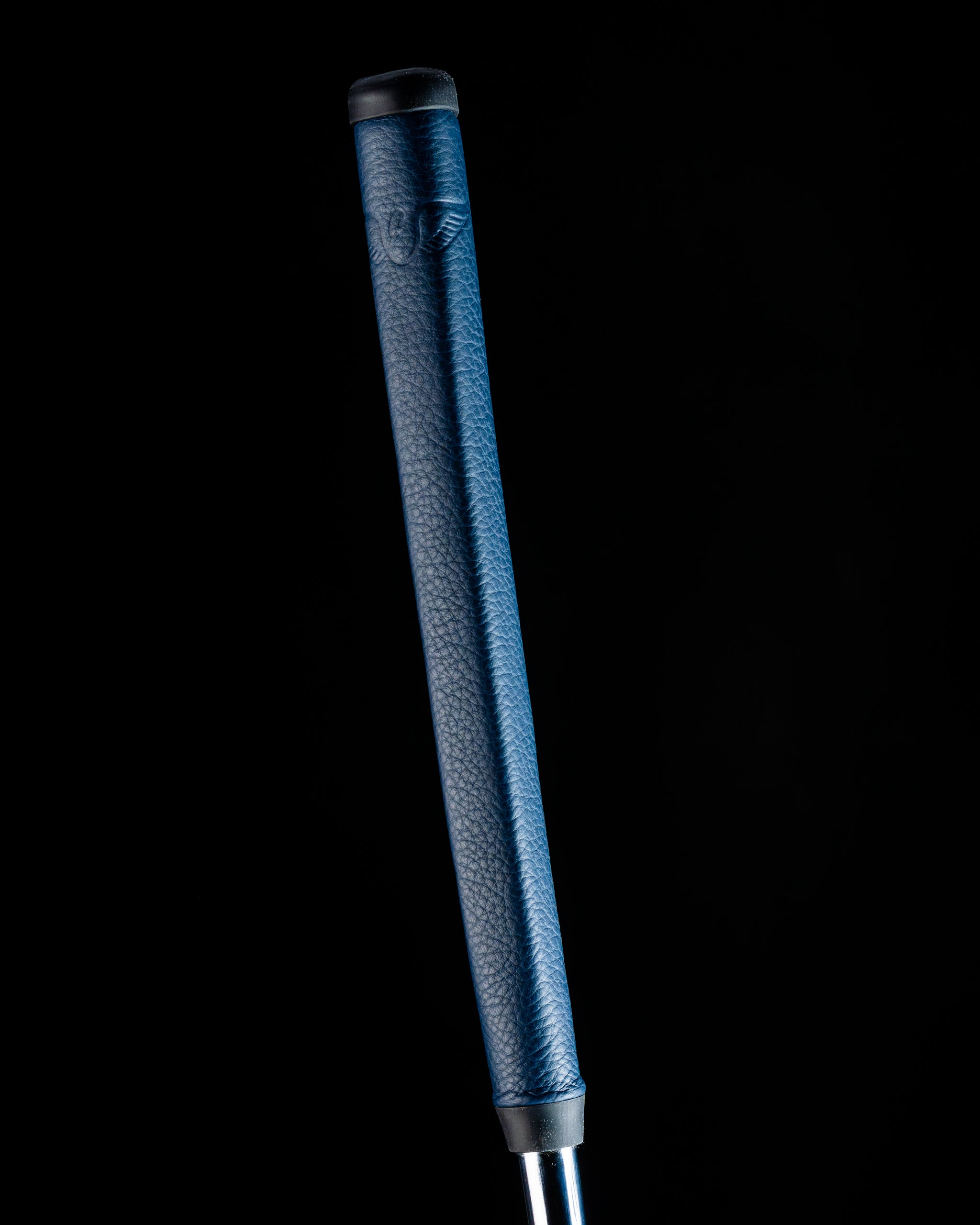 Edel Twister Putter featuring a textured blue grip, designed for enhanced control and precision on the golf course.