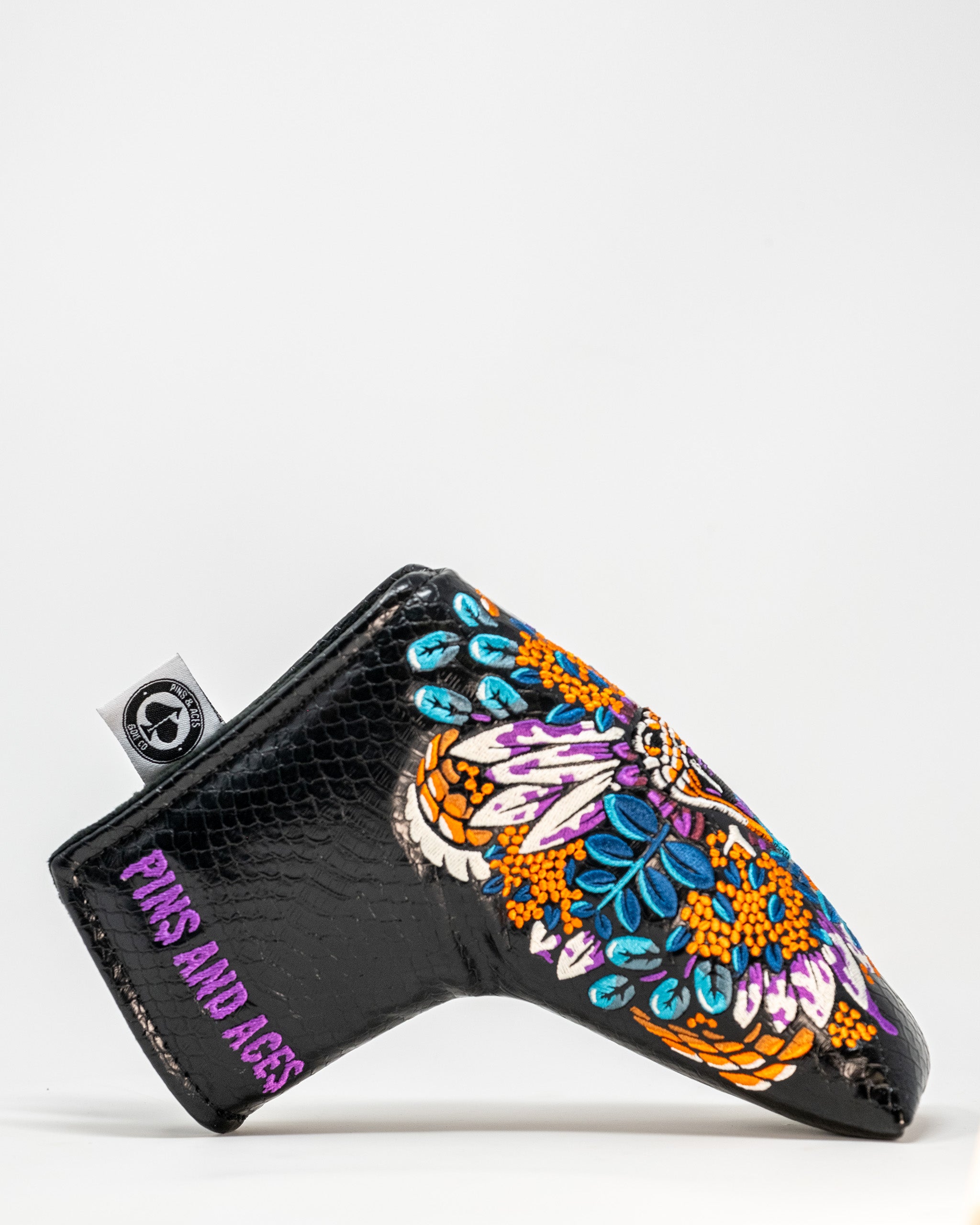 Venom Blade Putter Cover featuring a sleek design with a venomous snake motif, ideal for golf enthusiasts seeking stylish club protection.