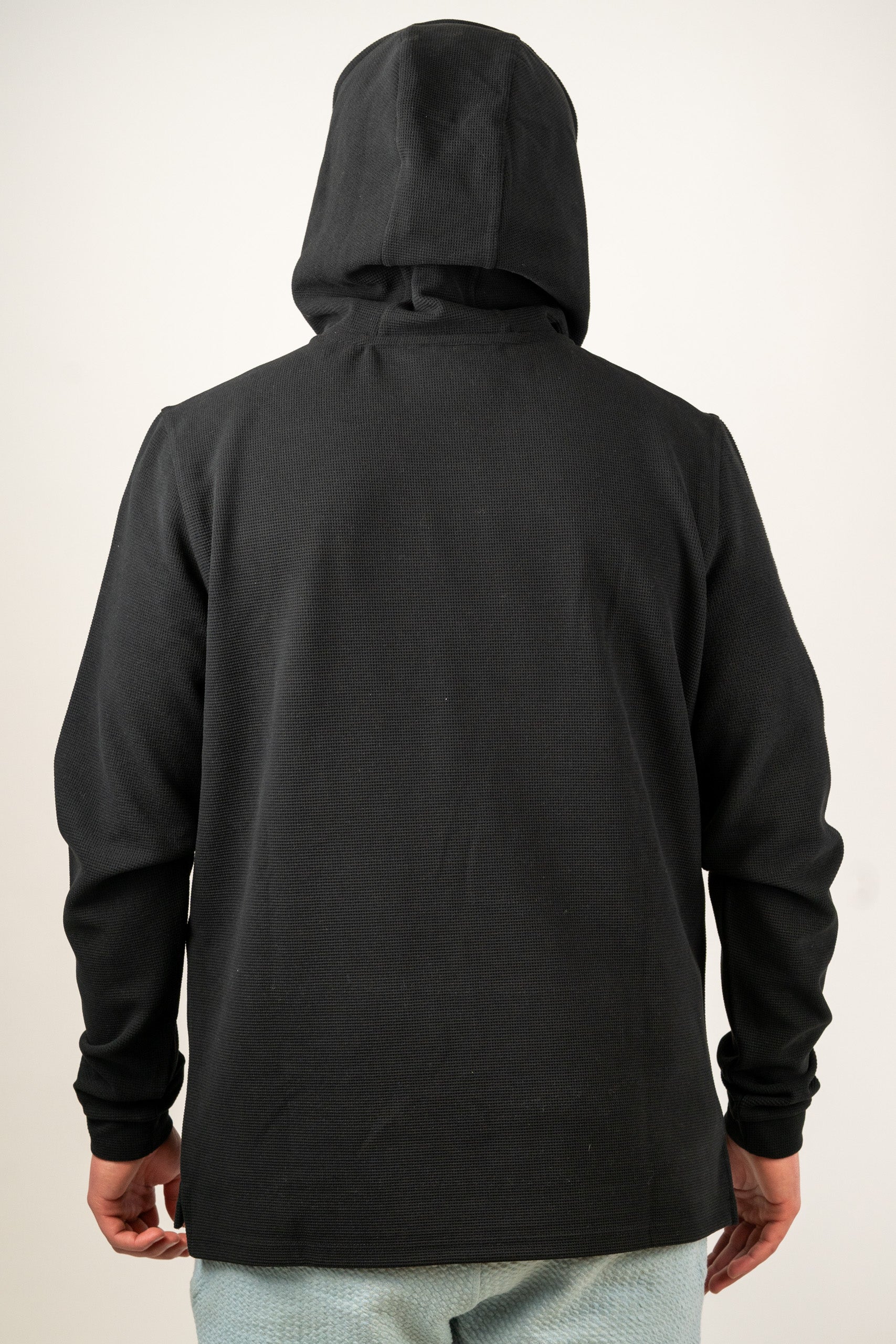 Back view of the Player Preferred Waffle Grid Hoodie in Obsidian, showcasing its sleek black design and comfortable fit.