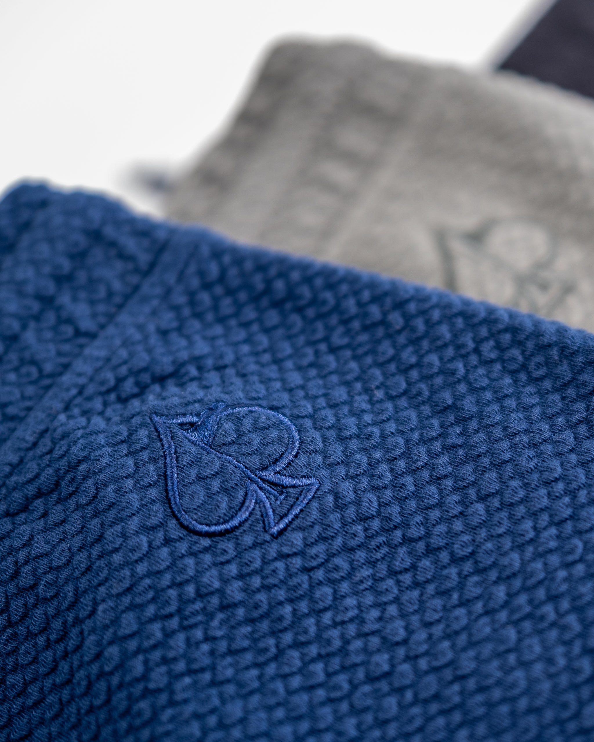 Player Preferred™ Waffleknit Shorts in Admiral blue featuring a textured, breathable fabric and side pockets.
