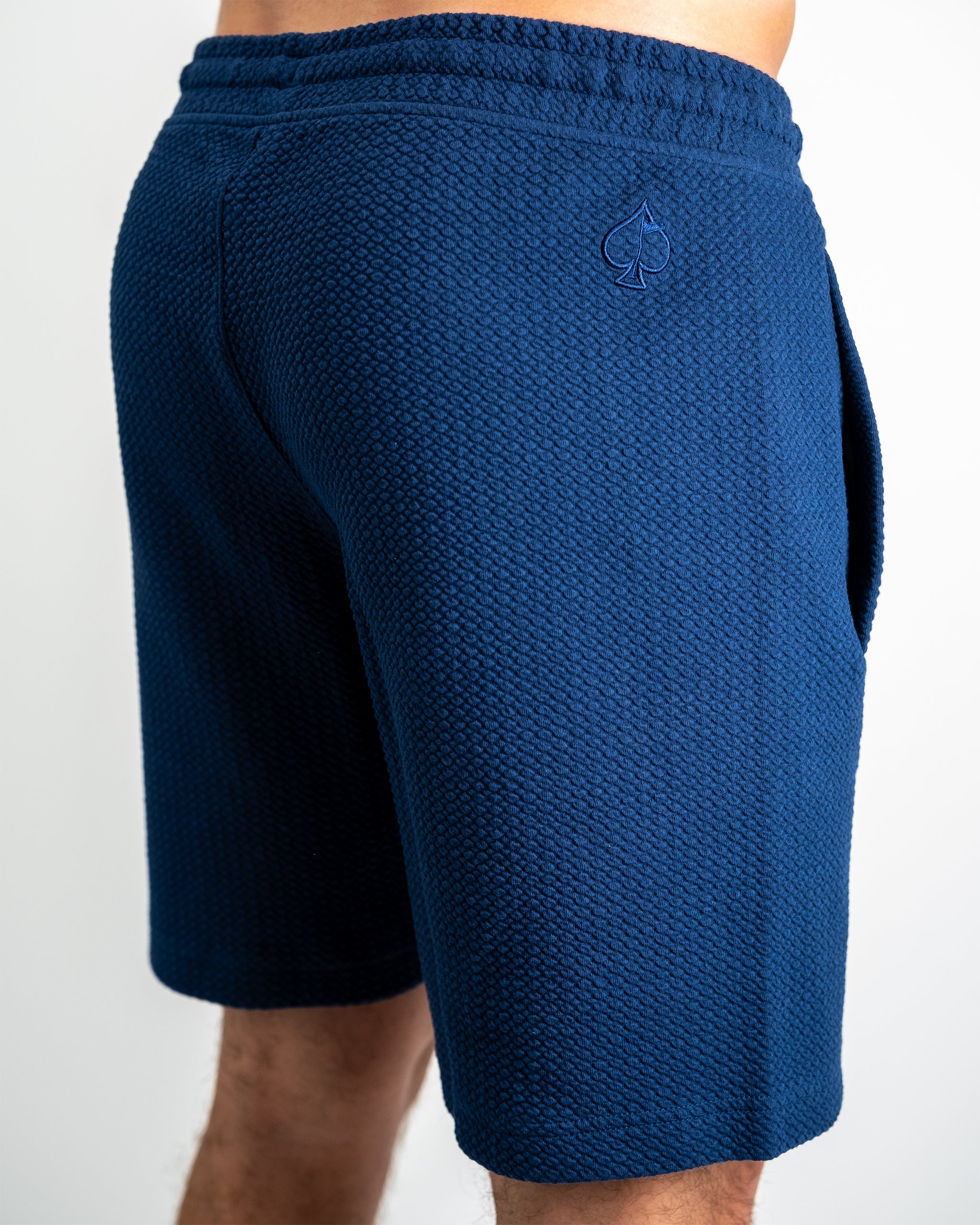 Waffleknit shorts in Admiral blue, featuring a relaxed fit and elastic waistband.