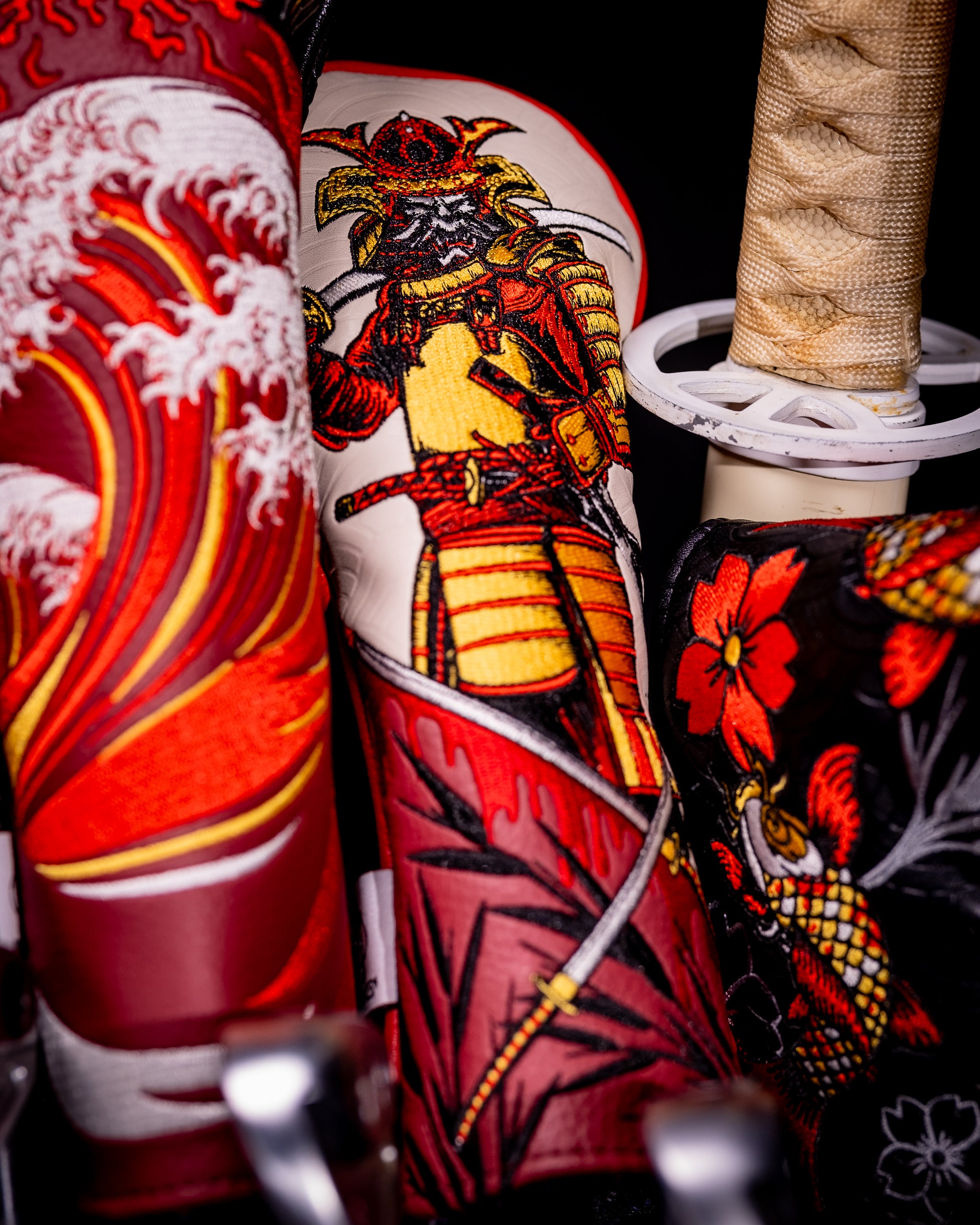 Samurai's Strength hybrid golf club cover with striking warrior design on a black background.