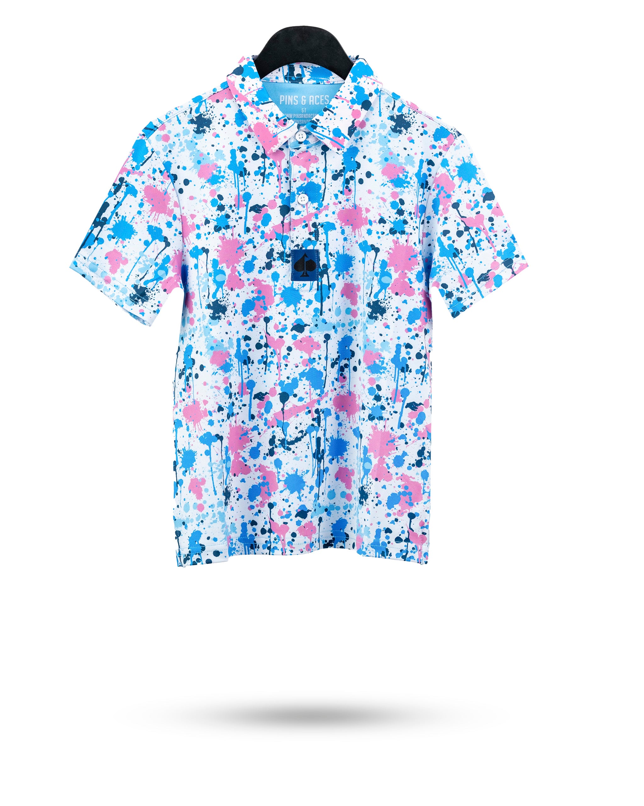 Youth Cotton Candy Drip Polo featuring a vibrant splatter design in pink and blue on a white background.