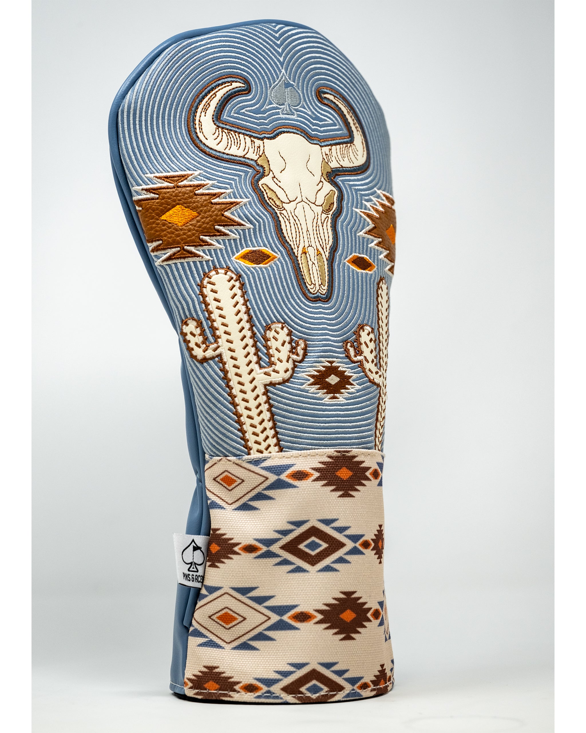 Western aesthetic driver cover featuring a rustic design with a cowboy motif, made from durable fabric.