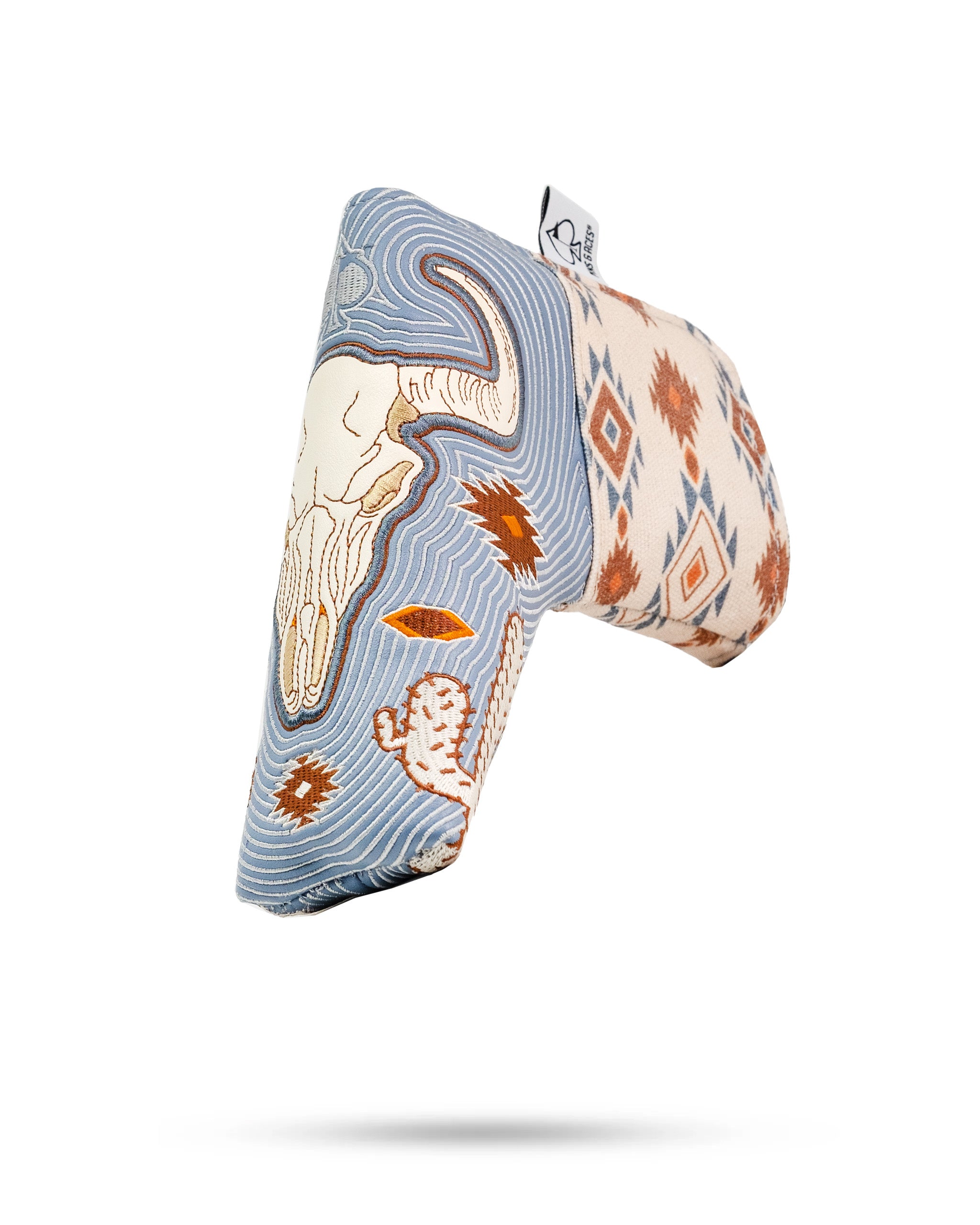 Western Aesthetic Blade Putter Cover with a colorful southwestern-inspired embroidered design featuring a skull, cacti, and geometric patterns.