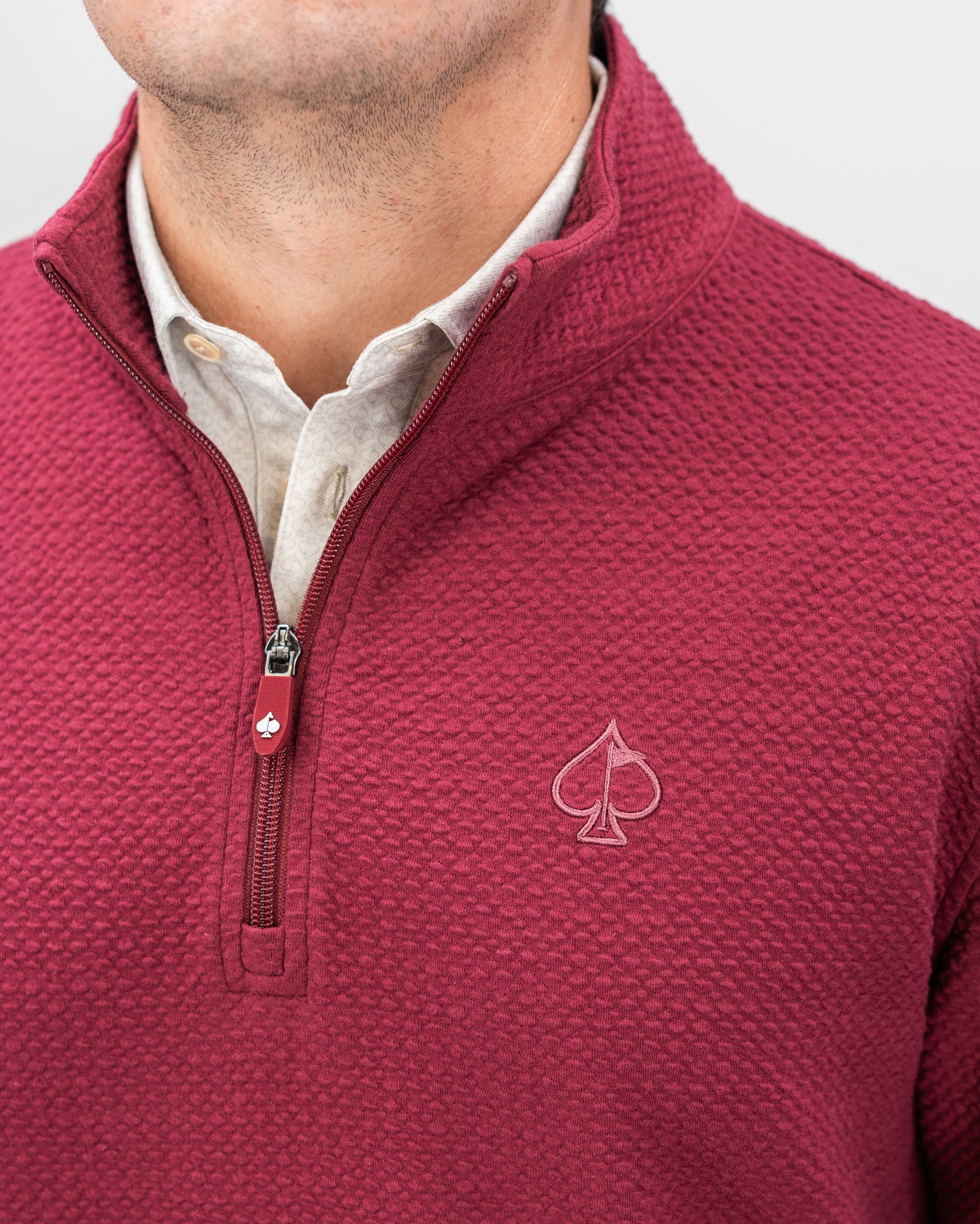 Player Preferred™ Waffle Knit Pullover in Merlot, showcasing a textured knit pattern and relaxed fit, perfect for cozy layering.