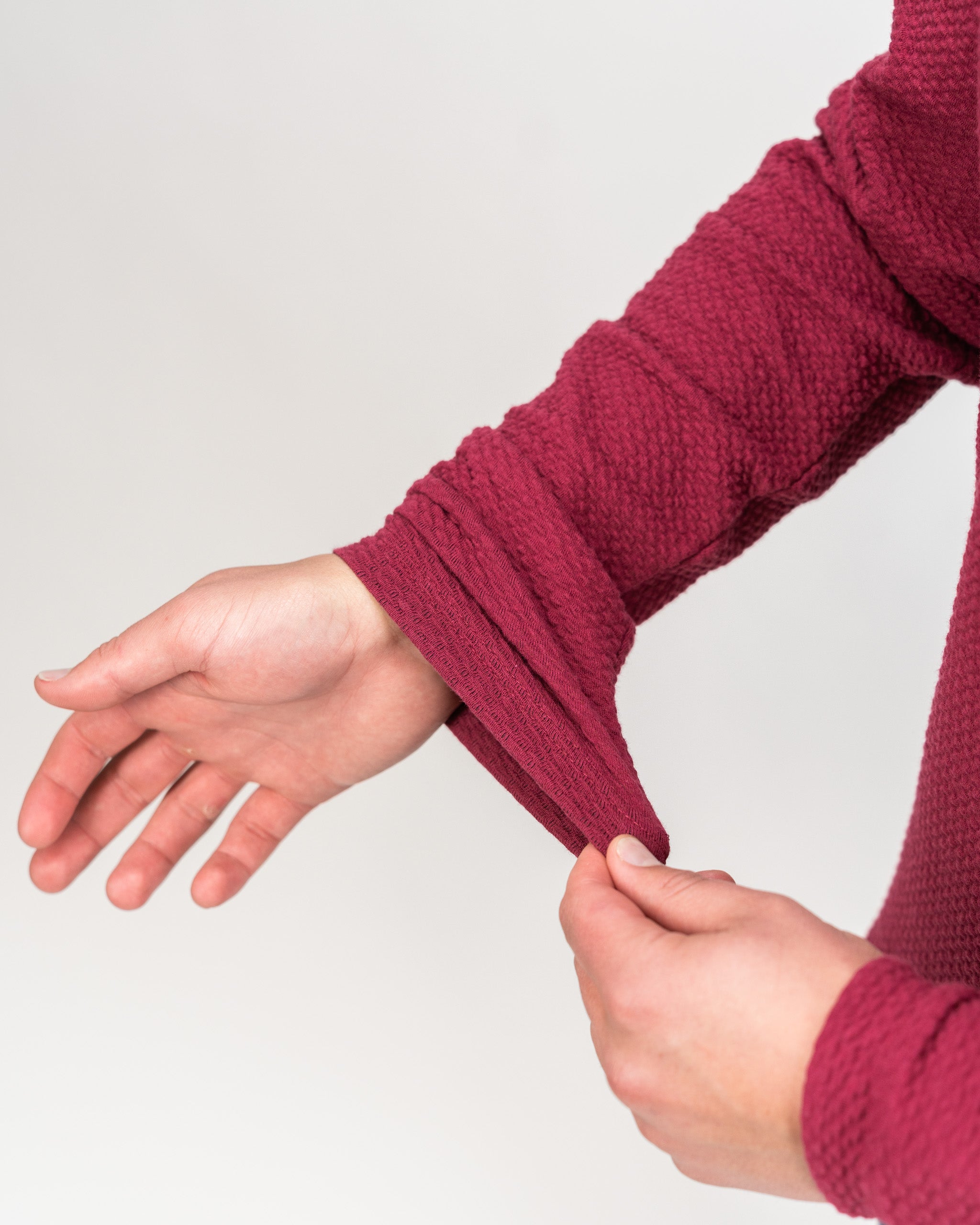 Player Preferred™ Waffle Knit Pullover in Merlot color, featuring a textured knit design and relaxed fit.