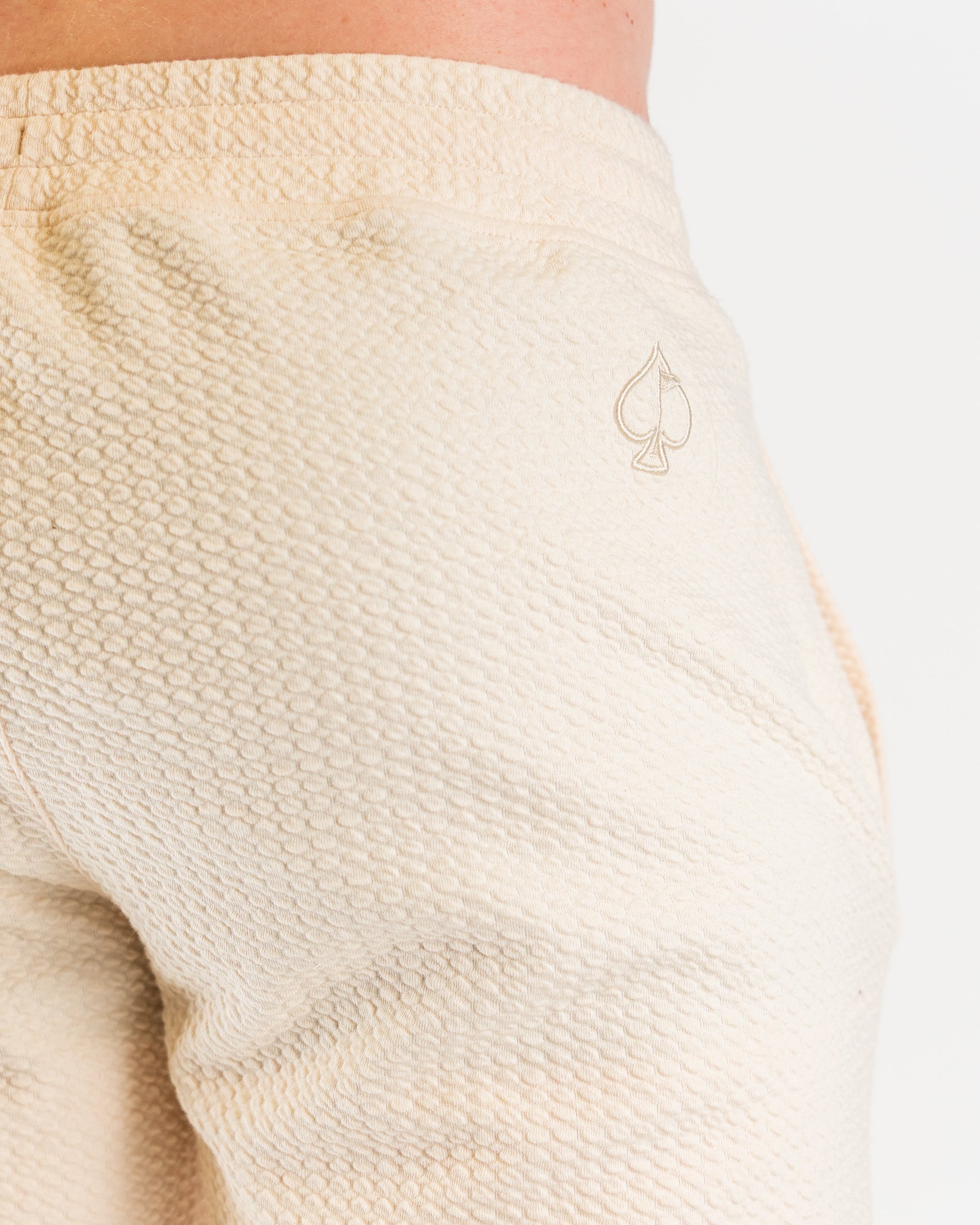 Player Preferred™ Waffle Knit Shorts in Cream, showcasing a textured fabric and elastic waistband.