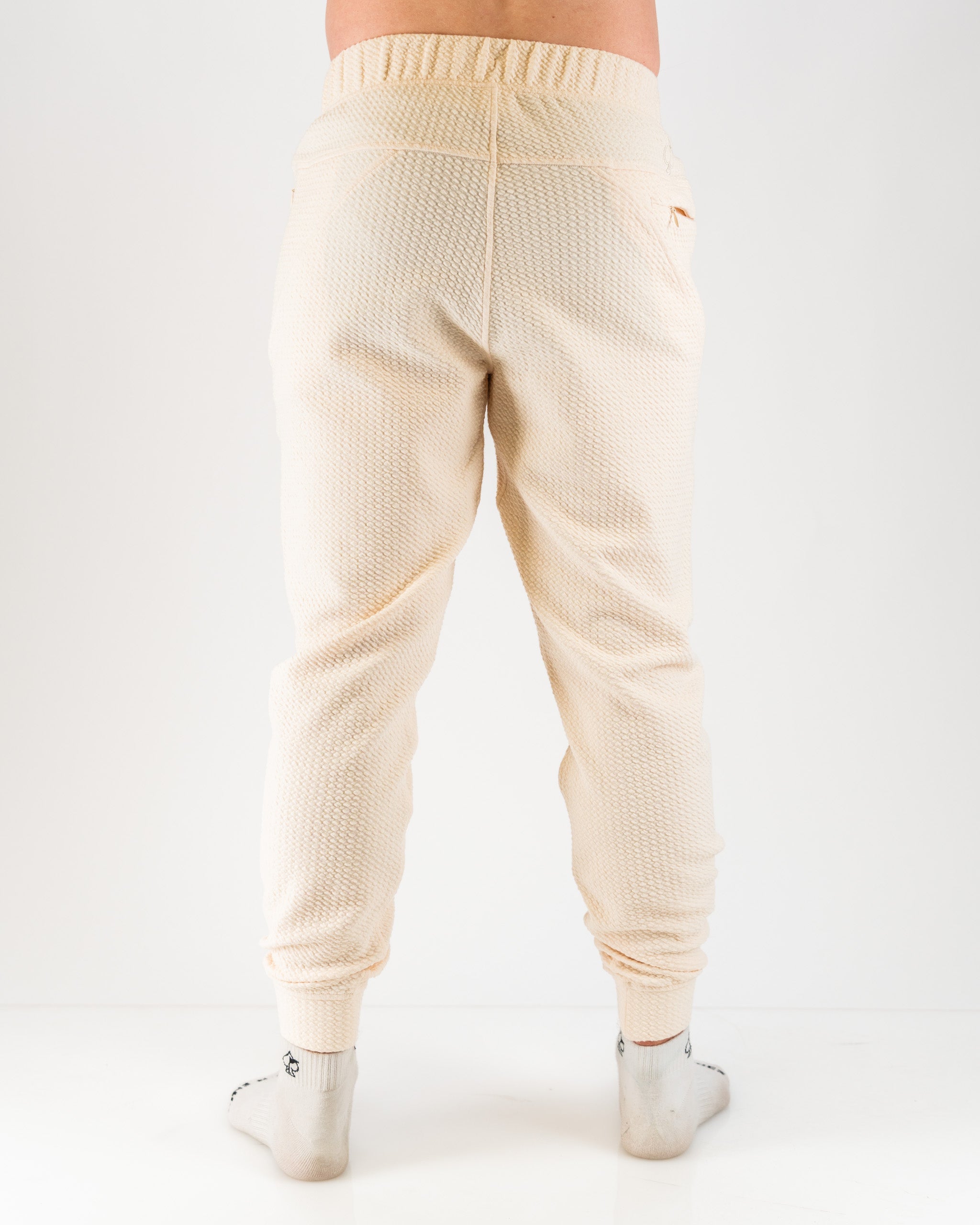 Player Preferred™ Waffle Knit Jogger in Cream, featuring a soft texture, elastic waistband, and tapered legs, ideal for casual wear or lounging.