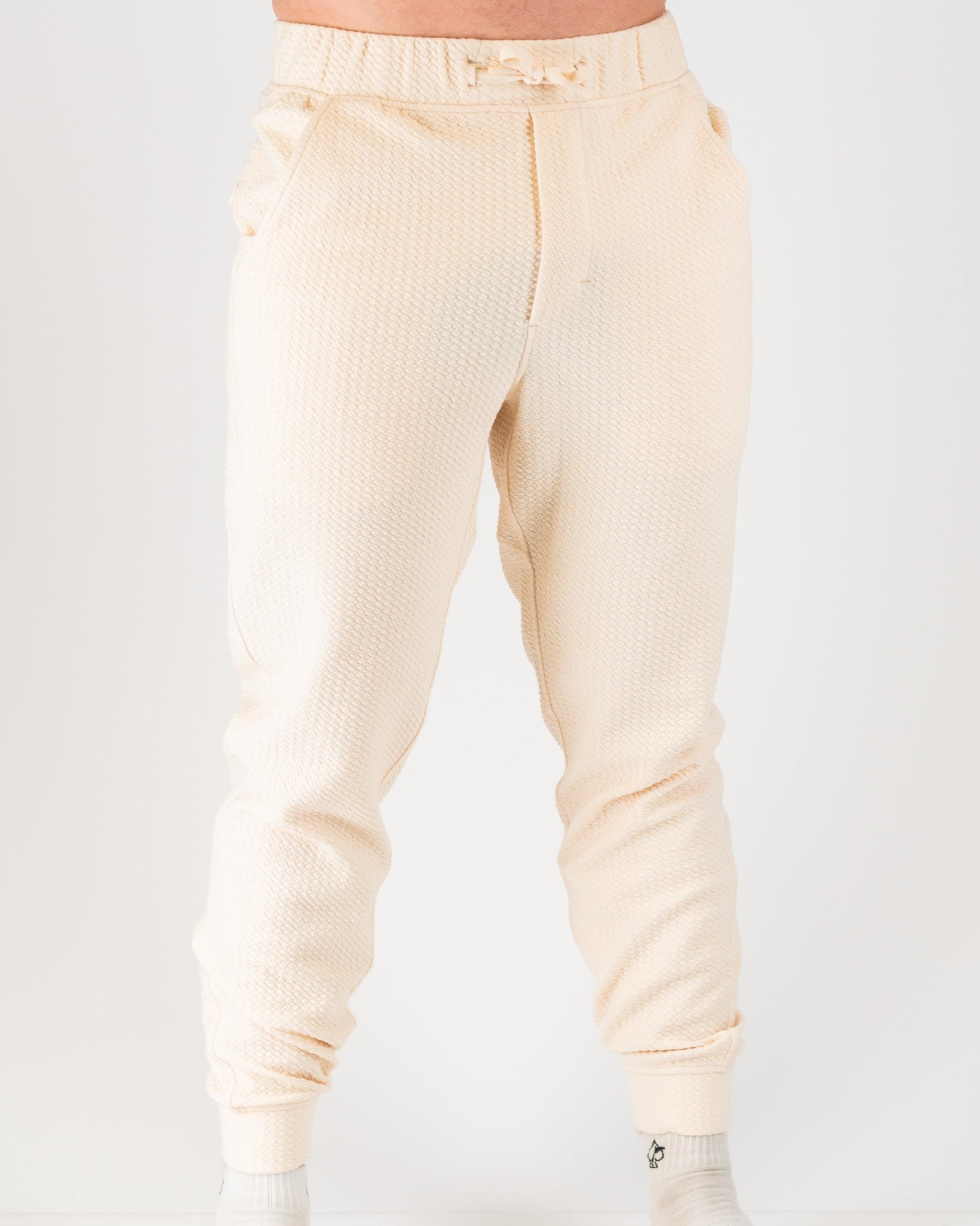 Cream Player Preferred™ Waffle Knit Jogger displayed on a white background, featuring a comfortable elastic waistband and side pockets.