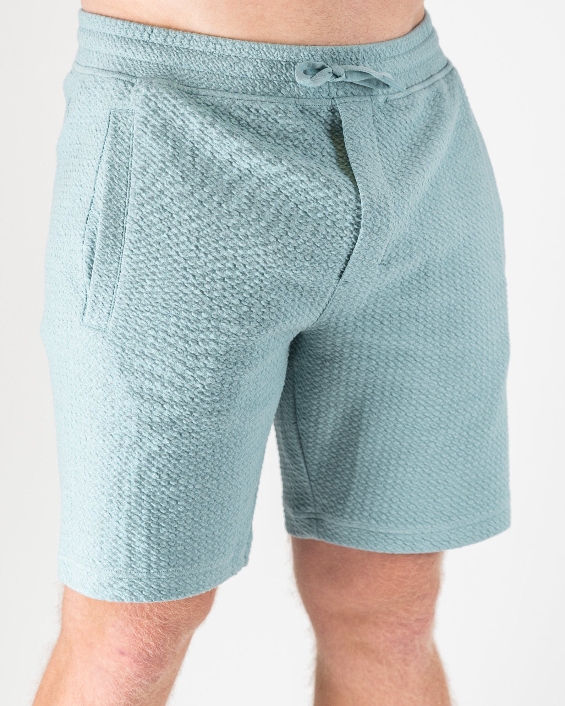 Player Preferred™ Waffle Knit Shorts in Blue Gray, showcasing a comfortable and stylish design with a soft texture and relaxed fit.