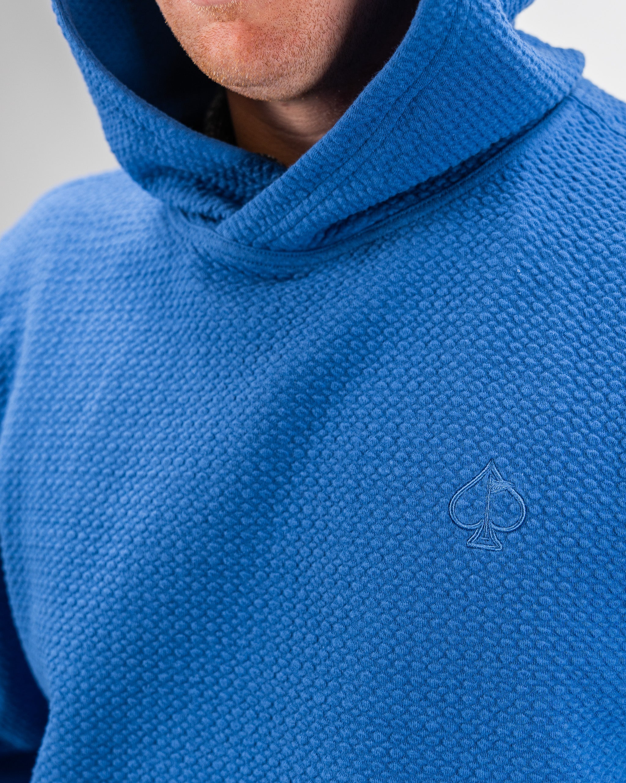 Player Preferred™ Waffle Knit Hoodie in Cobalt blue, featuring a cozy design and textured fabric.