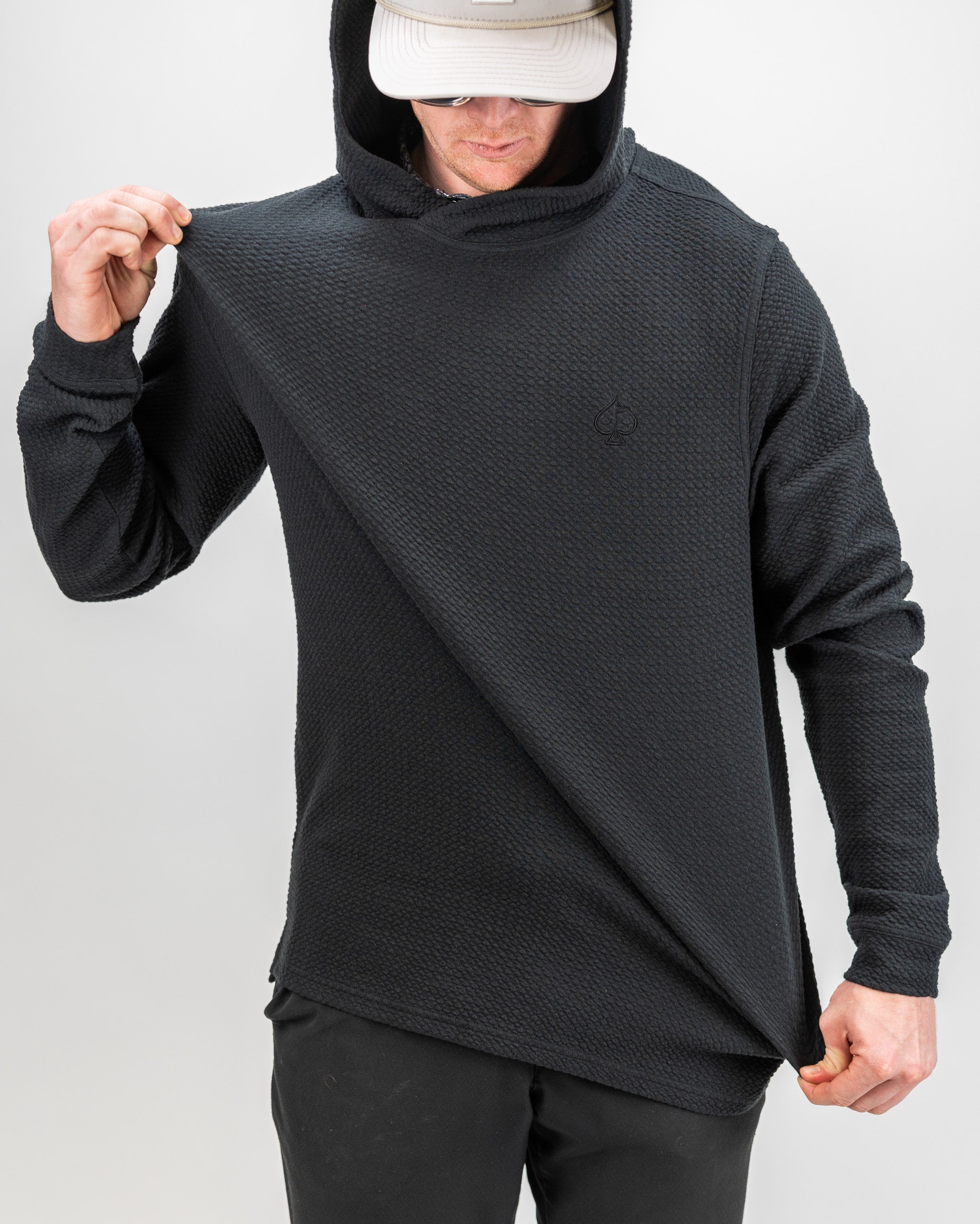Player Preferred™ Waffle Knit Hoodie in Obsidian, featuring a textured fabric, a cozy hood, and a relaxed fit.