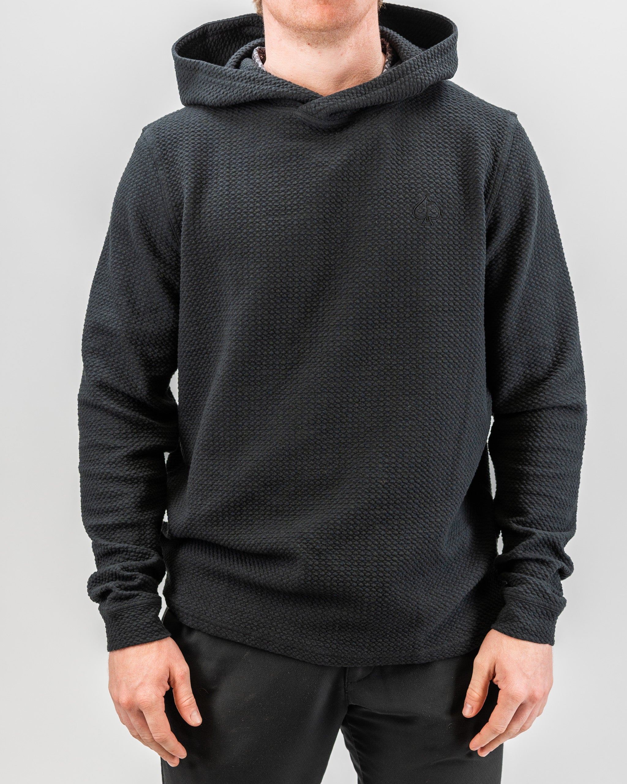 Player Preferred™ Waffle Knit Hoodie in Obsidian, showcasing a textured fabric, hood, and front pocket, displayed on a neutral background.