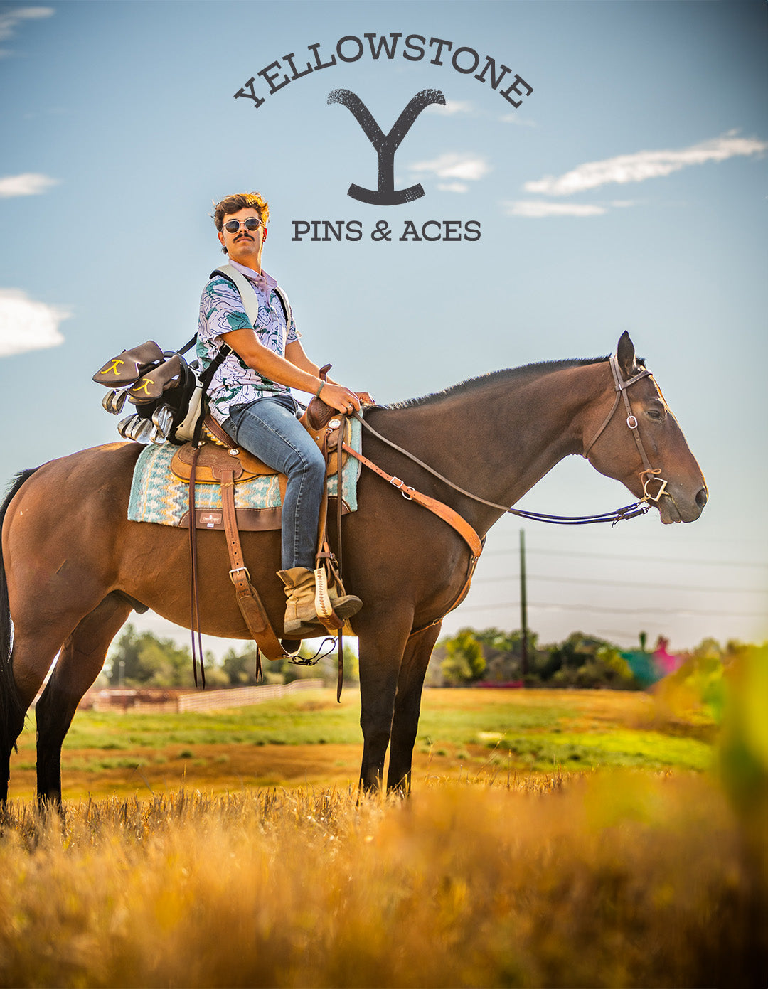 Young man in colorful golf apparel riding a brown horse with bold yellow golf headcovers, under a blue sky.