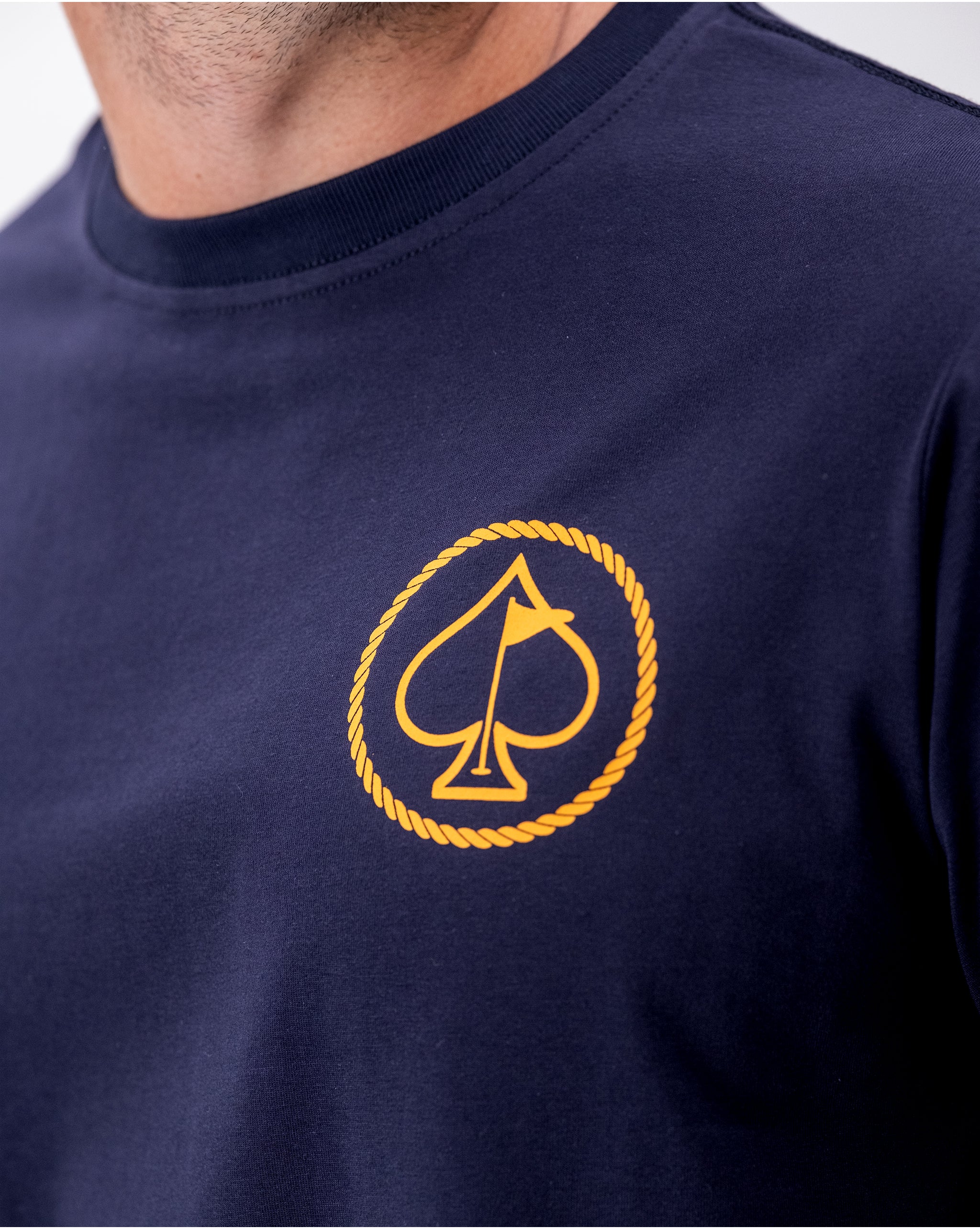 Yellowstone Logo Tee featuring a black design with Yellowstone National Park's iconic silhouette on a forest green background.