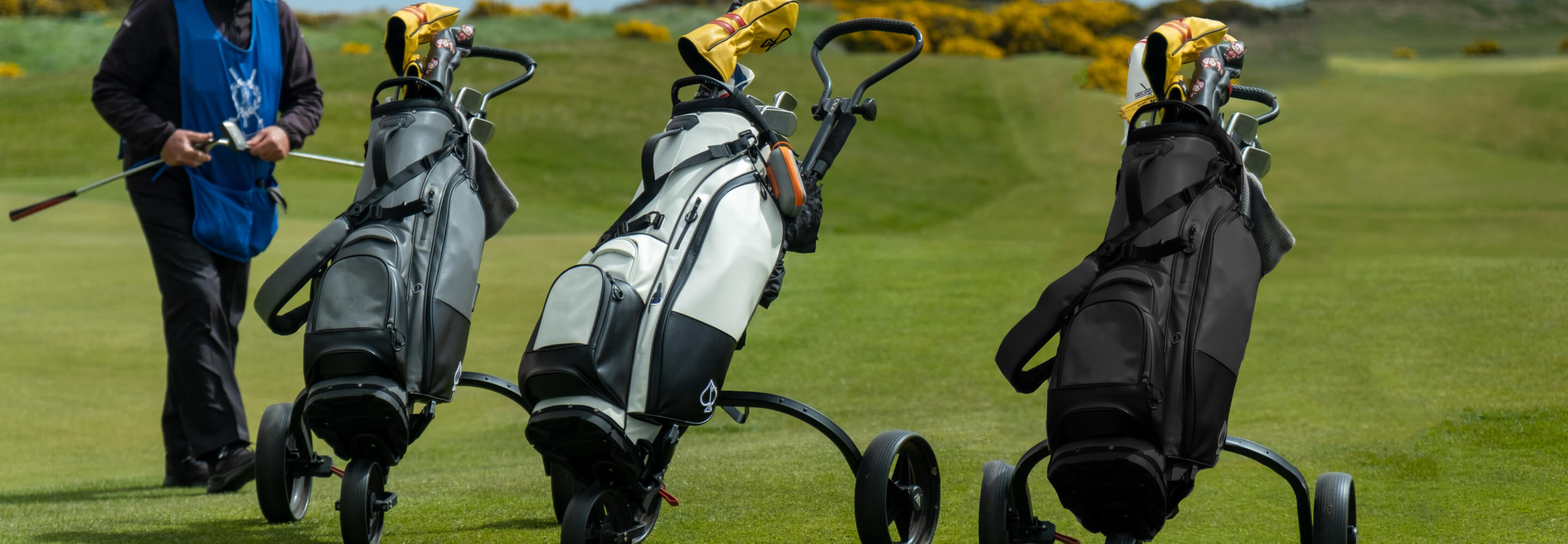 Bold golf headcovers and accessories in black, white, and gray for golfers who stand out on the course.